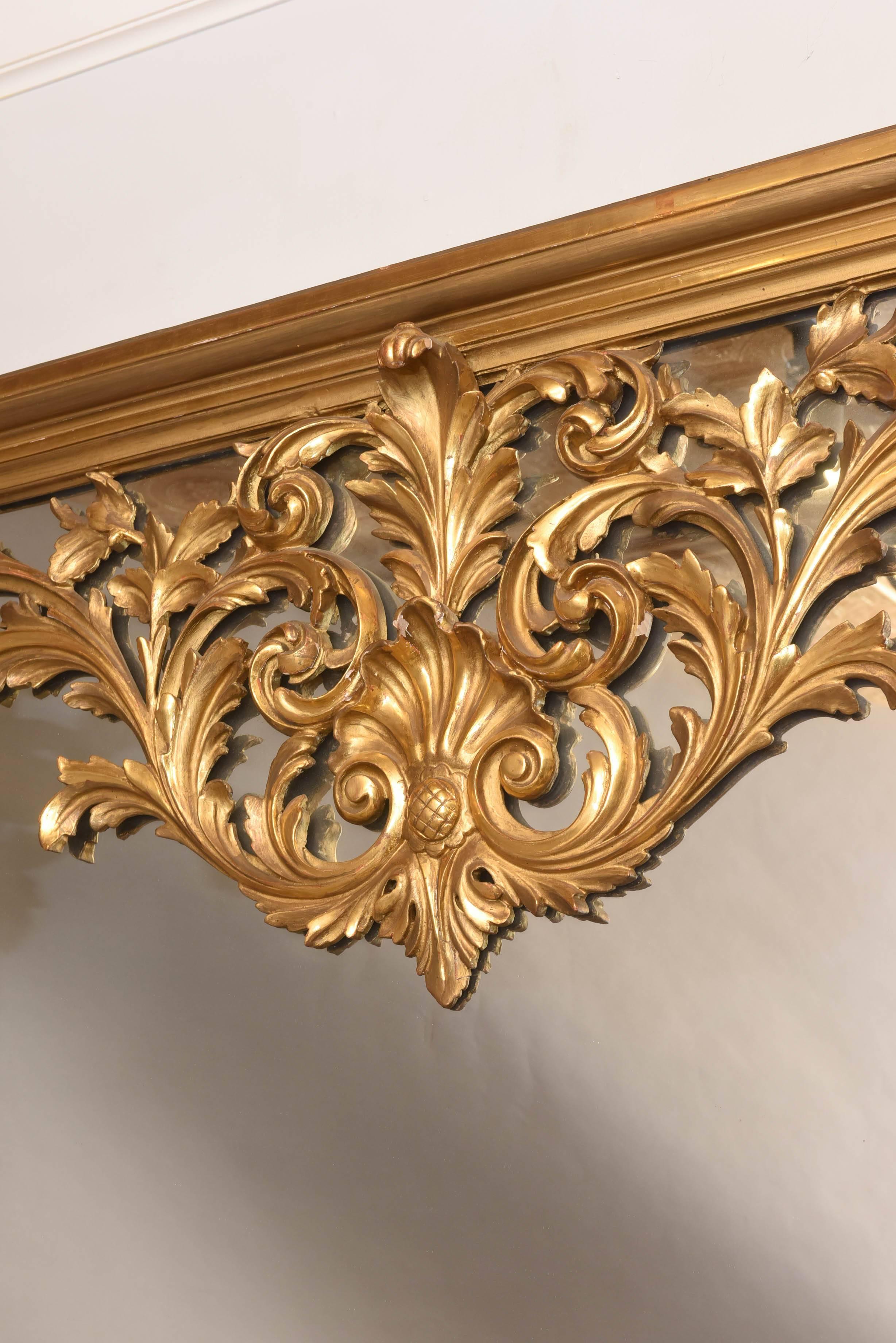 Carved Large Sized, Victorian Giltwood Overmantle Mirror, with Scrolling Pediment