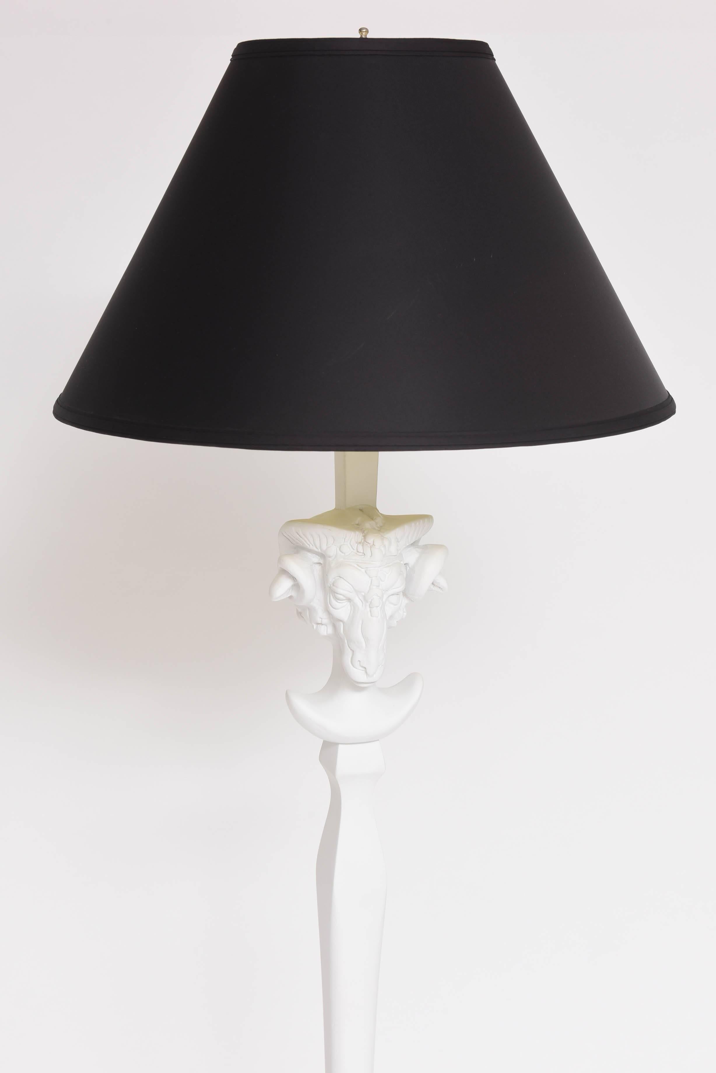 This pair of floor lamps take there inspiration from pieces created by Sirmos with their white plaster-like-finish. The rams head and hooves pay homage to the astrological sign of Taurus.

