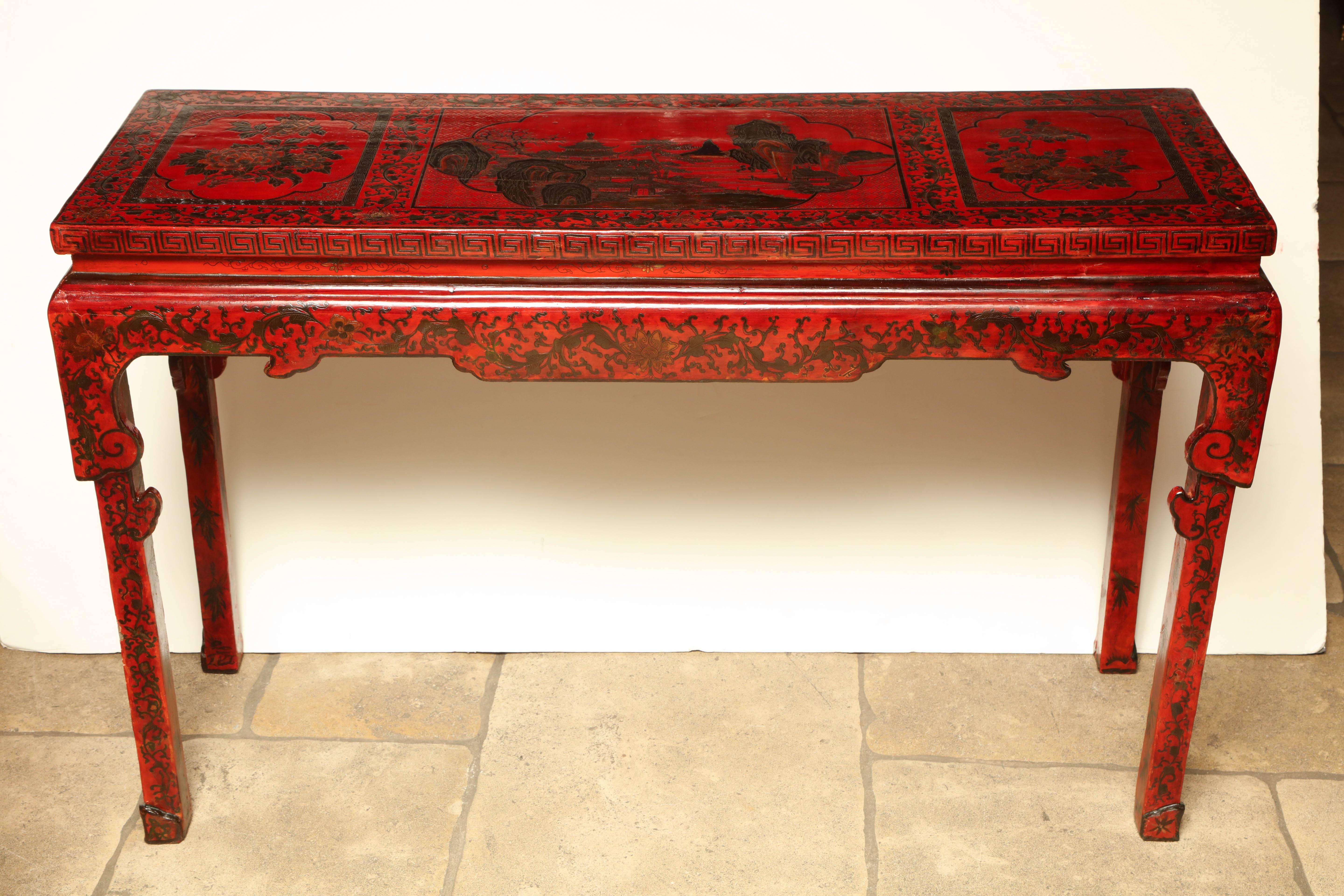 Chinese red lacquered chinoiserie decorated alter table.