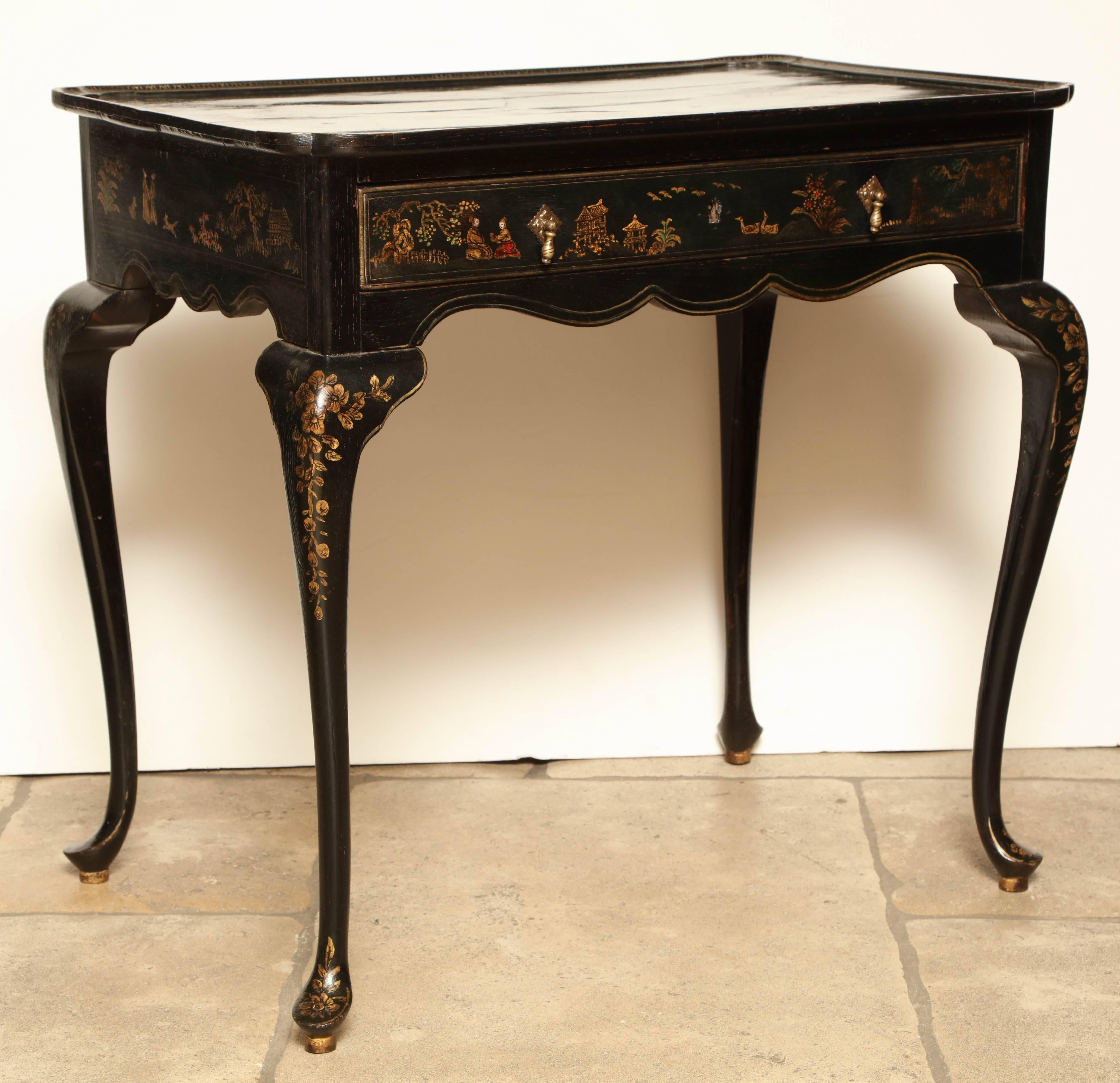 Queen Anne black lacquered chinoiserie decorated tea table with single frieze drawer on cabriole legs.