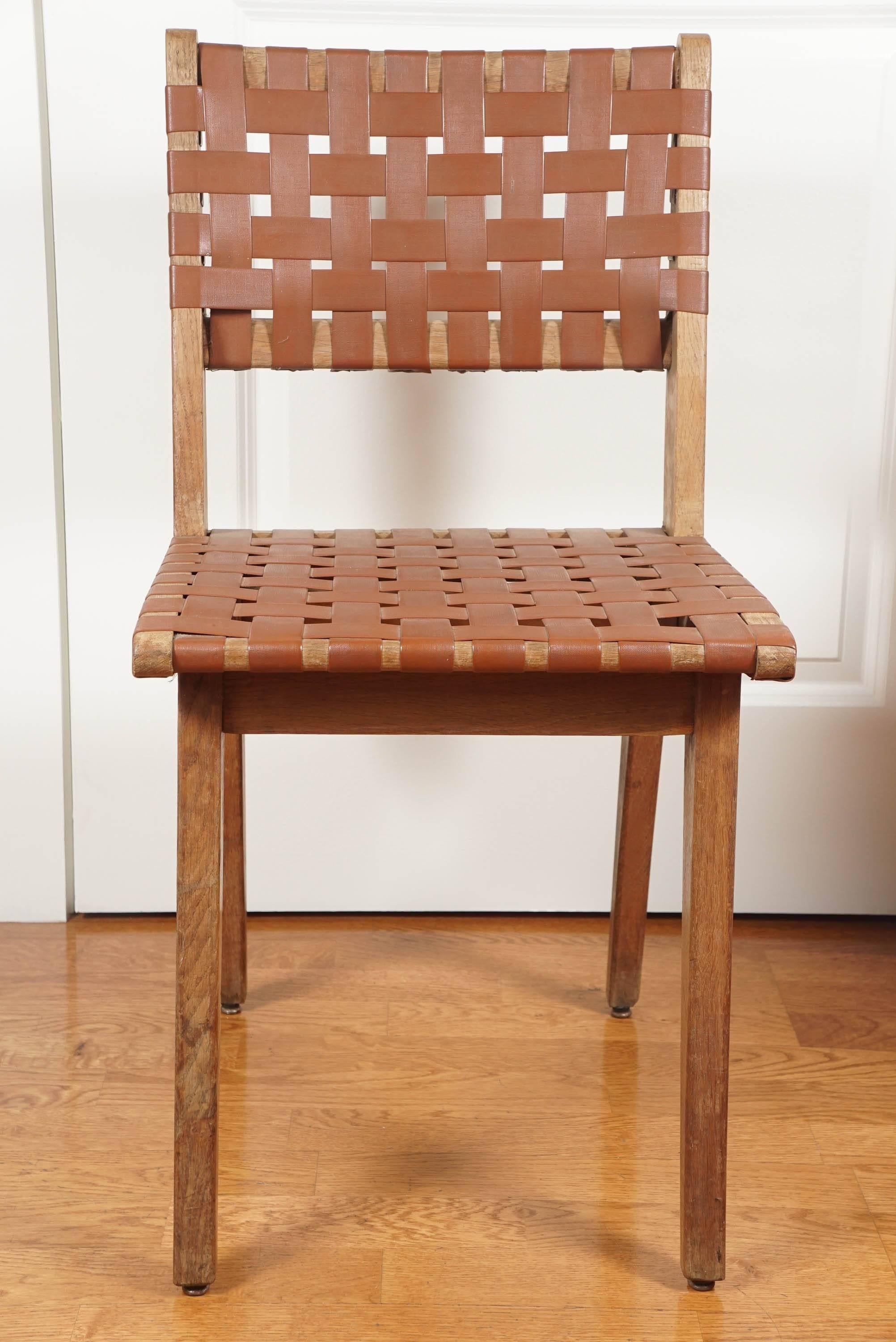 Oak dining chair, with nylon webbing, in the manner of Jens Risom for Knoll.
A quantity of ten are available.