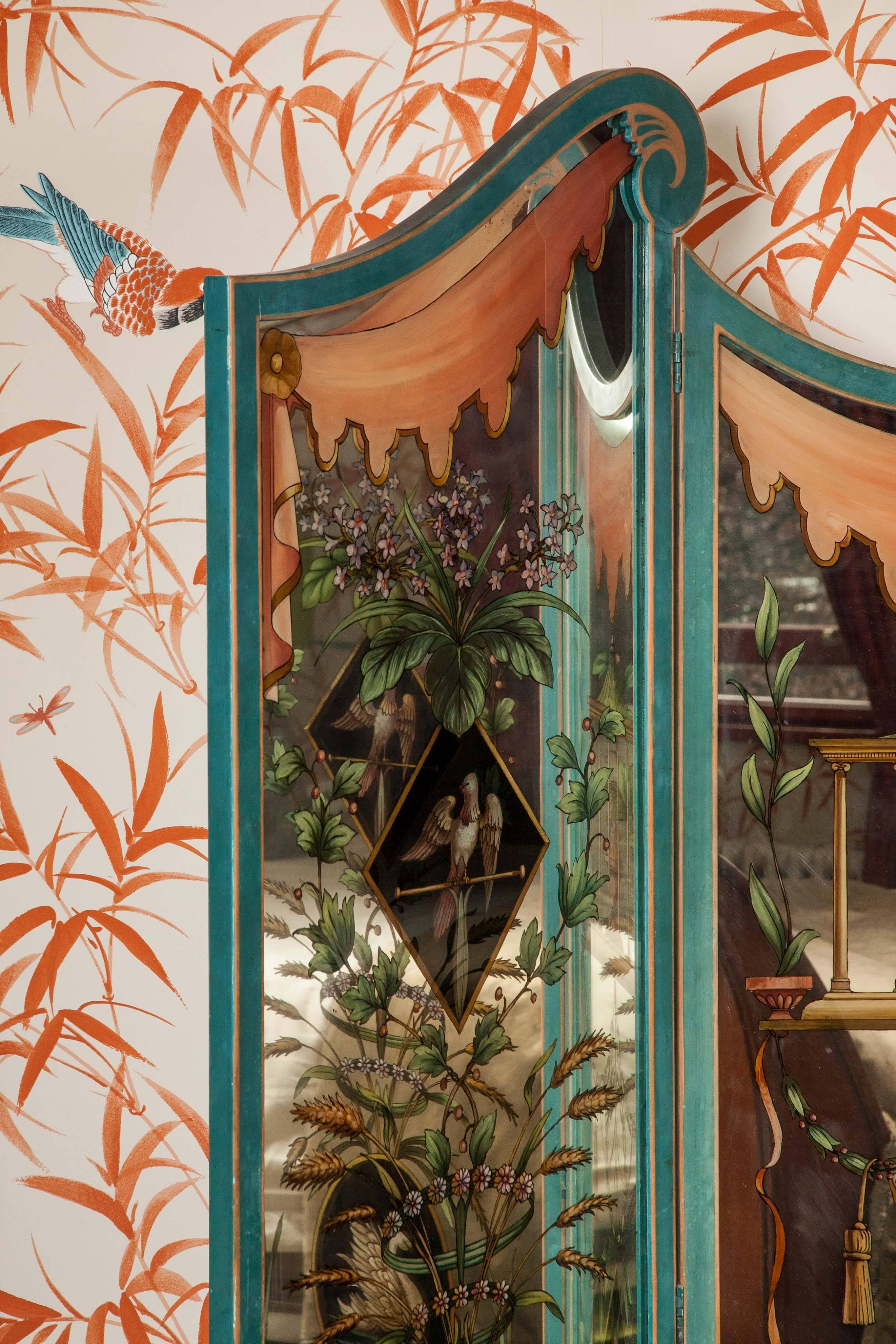Adorned with beautiful paintings of flora and fauna and featuring swans and other wildlife this gorgeous mirrored screen is the perfect glamorous addition to a bedroom or dressing room. 

