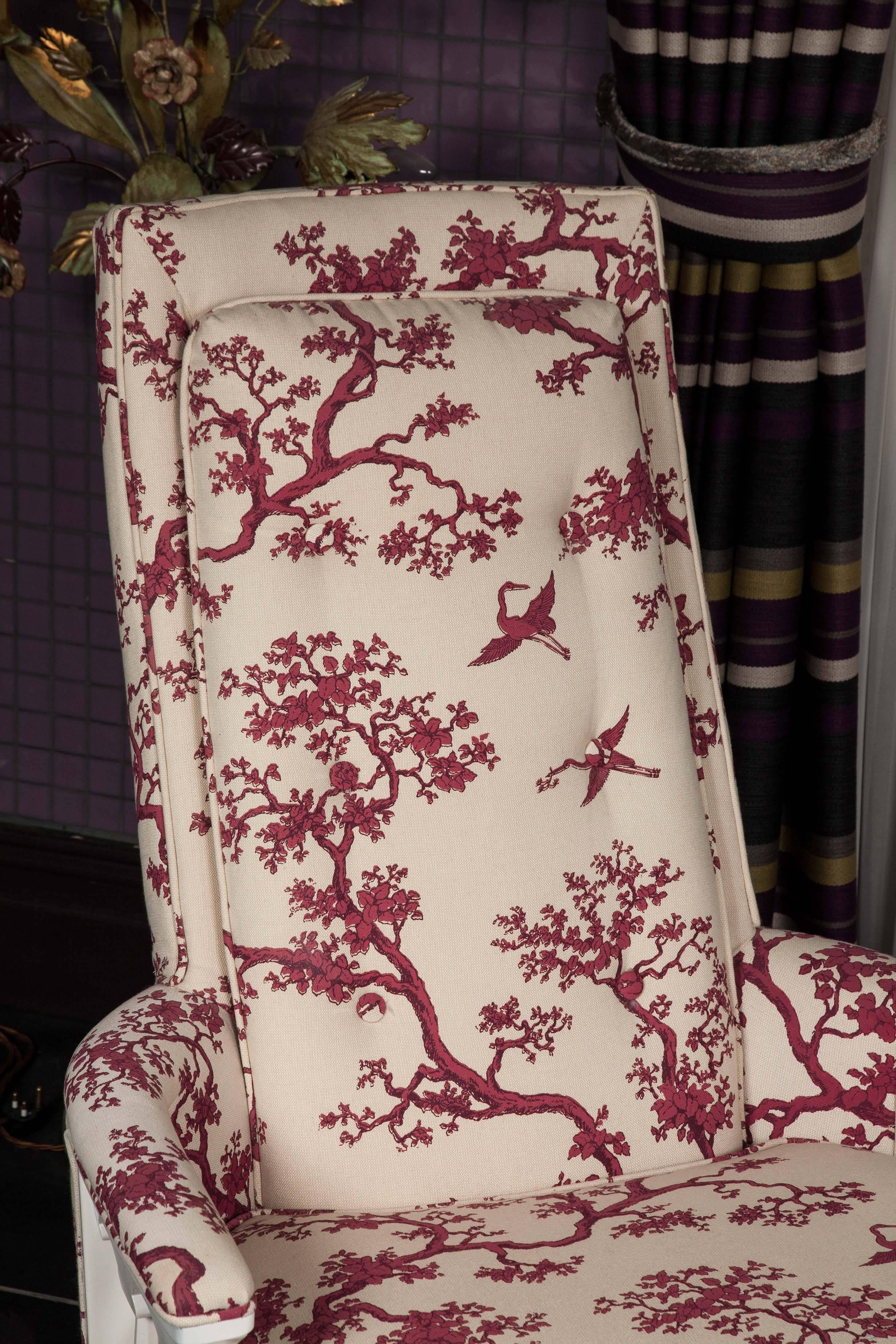 Vintage chair re-invented with traditional delicately patterned fabric and sprayed white wooden frame.