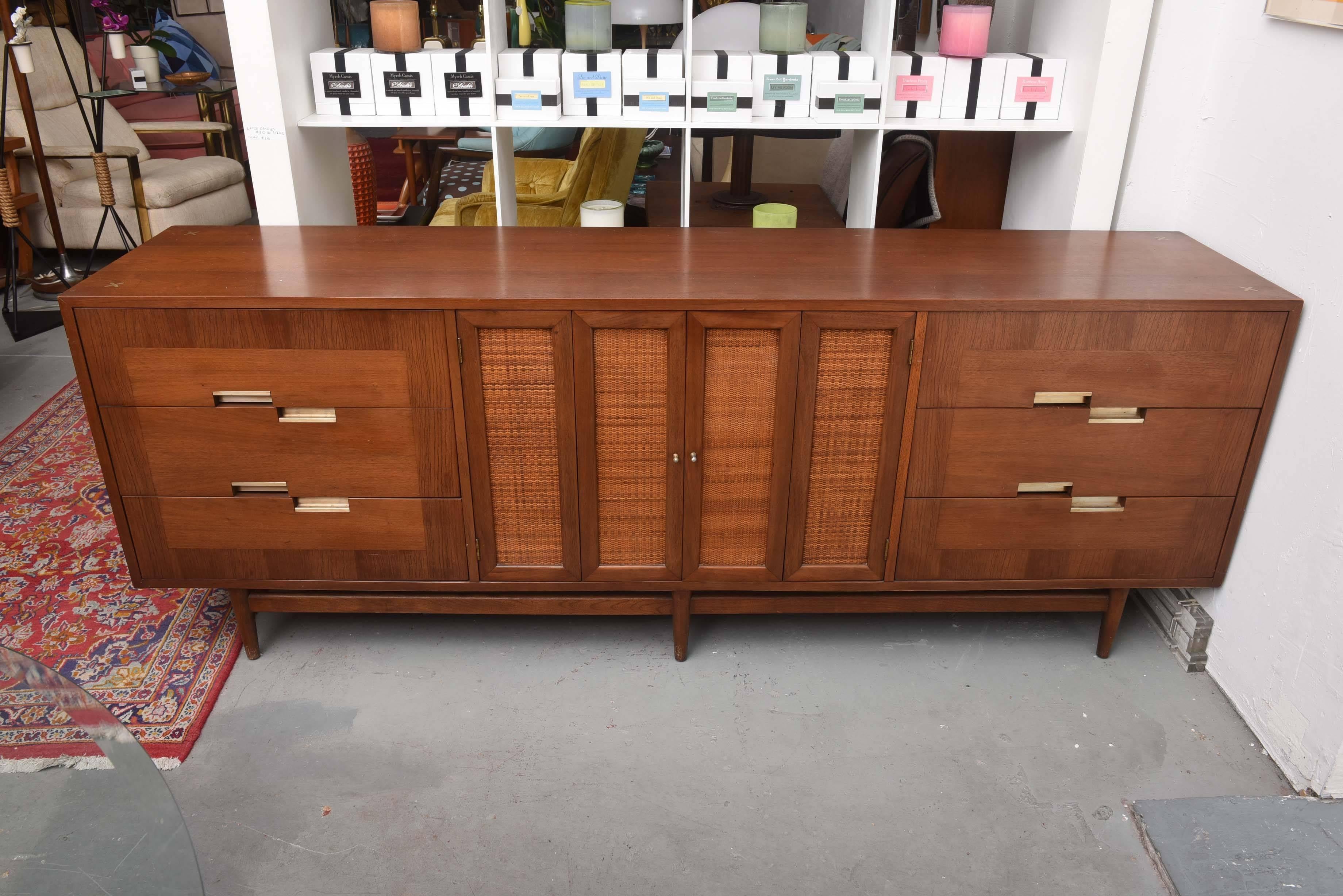 Gorgeous monumental Martinsville credenza with brass accents and canned doors, USA, 1960s.