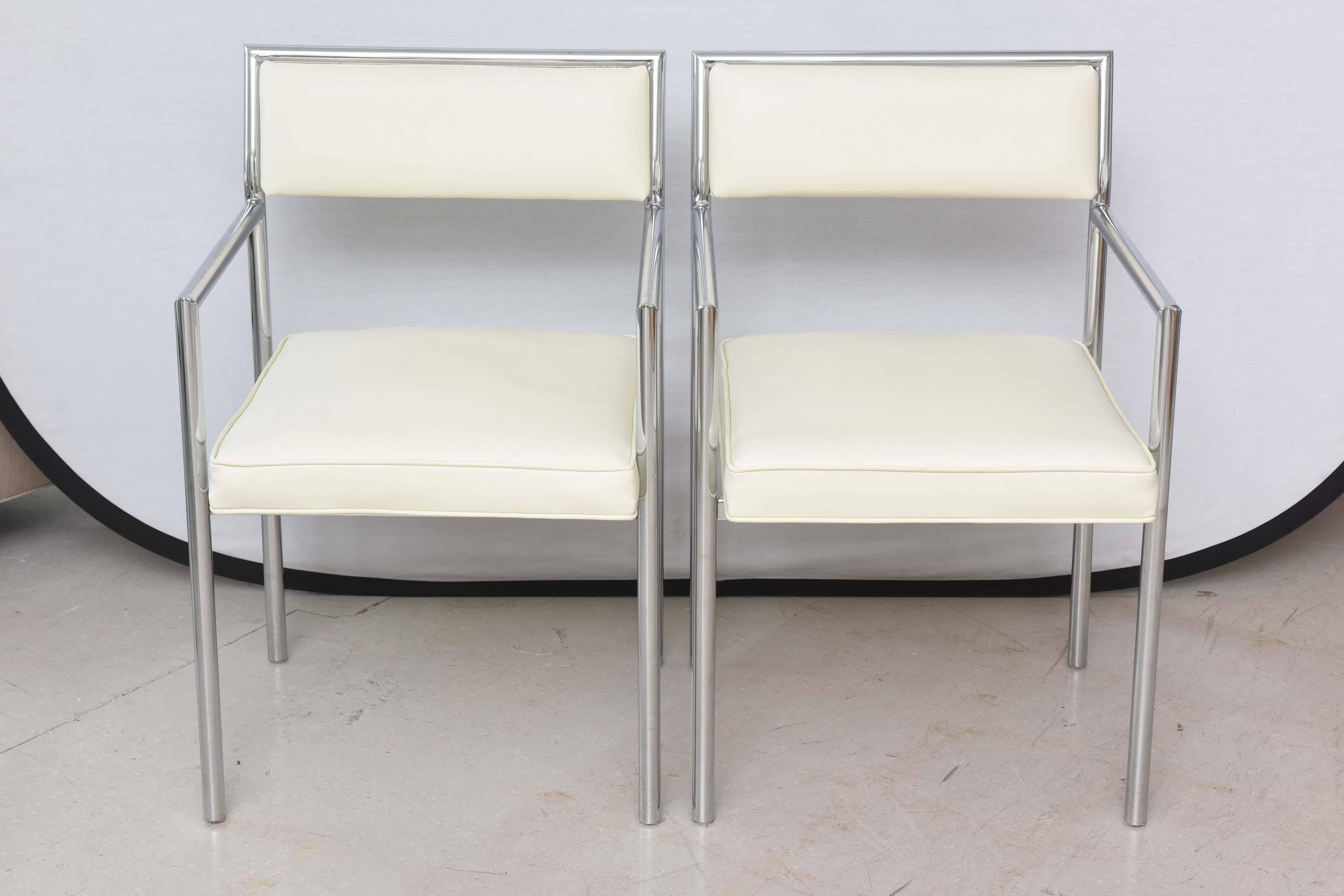 Set of six streamline chrome and white upholstered chairs by Design Institute of America.