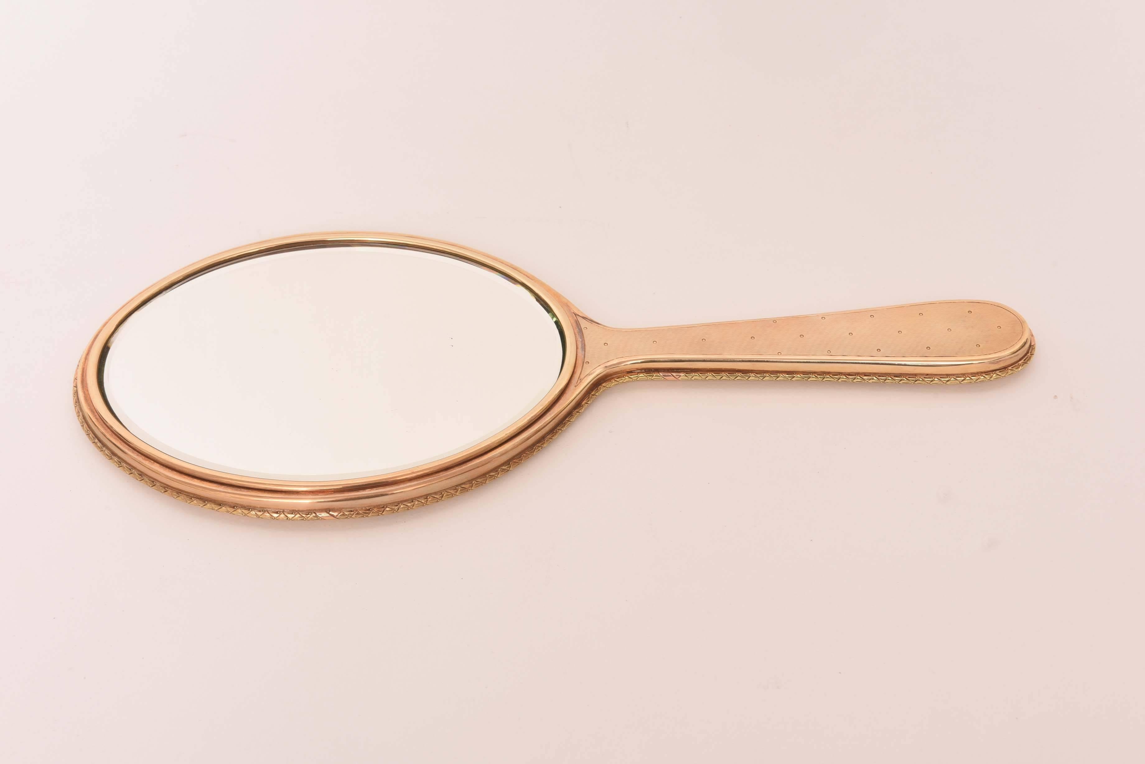 vintage gold hand mirror