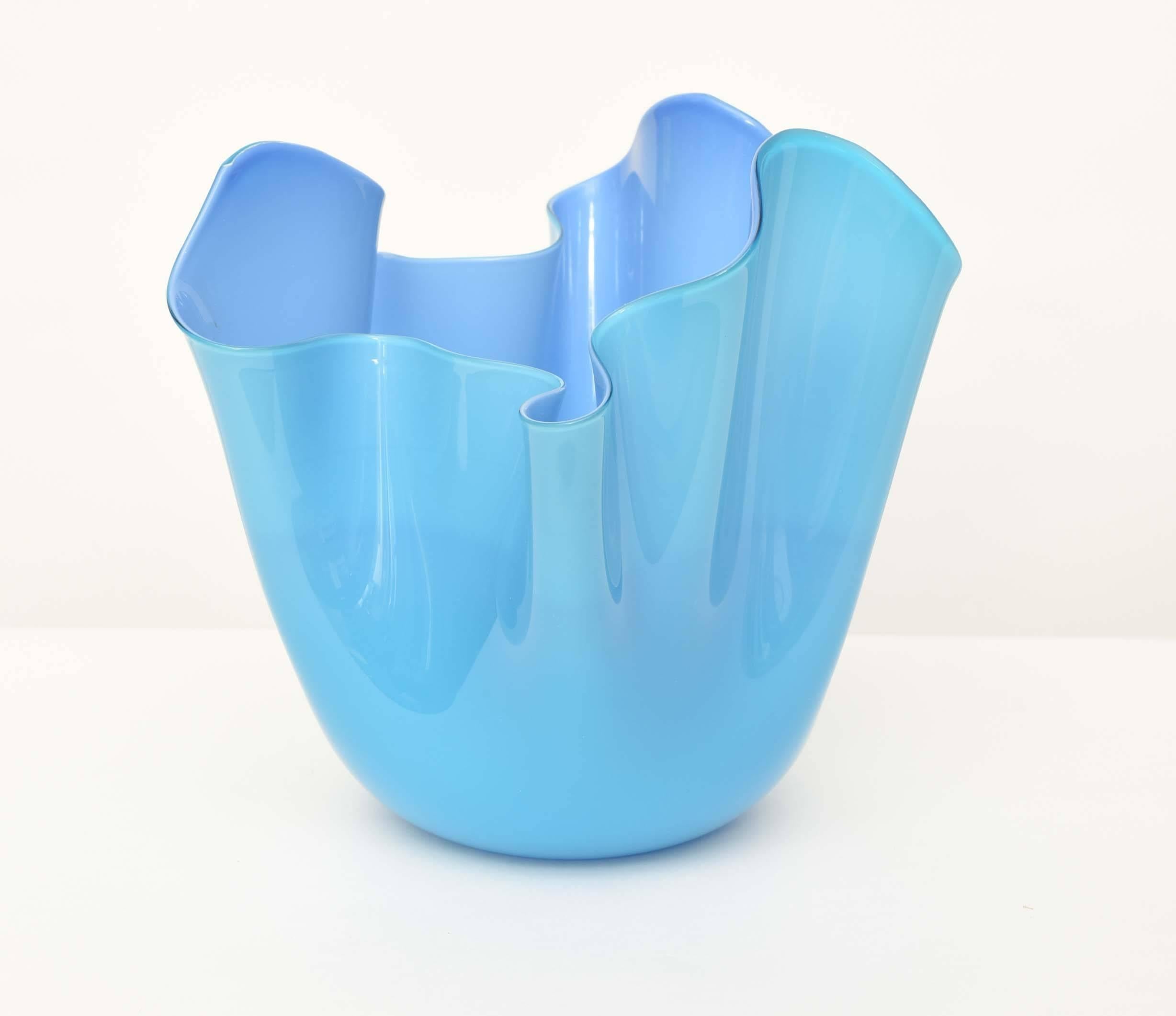 Perfectly executed Fazzoletto bowl by Venini. Shades of opaline and azure blue colored glass juxtaposed on each other. Signed.