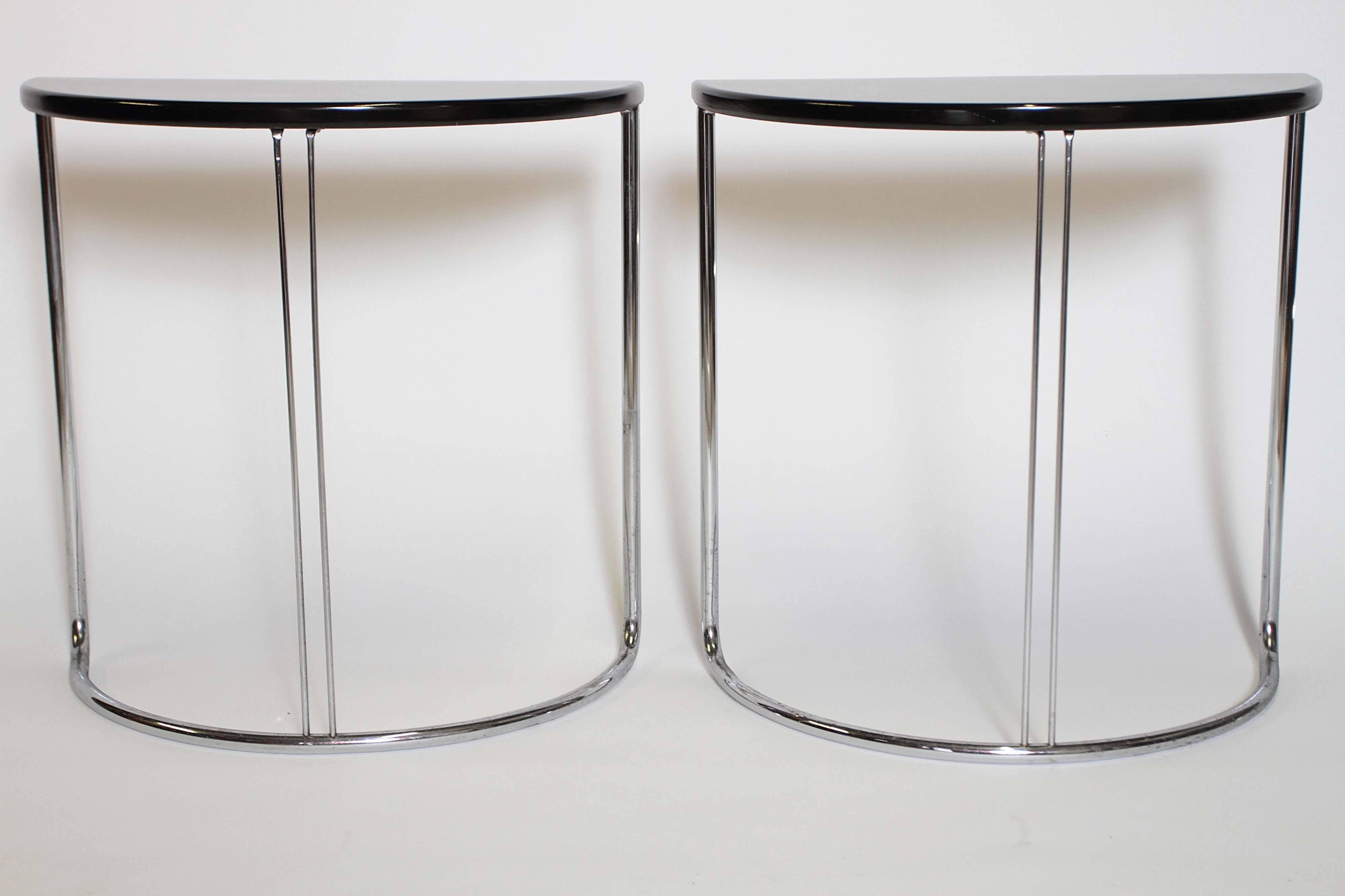 One of two Rohde original thin-rod streamline designs for Troy. 
Model #183 end table.
Very versatile, these work together as center table or apart flanking a sofa, or as twin consoles against a wall.
Troy streamline Metal decals.
Exc. lacquered