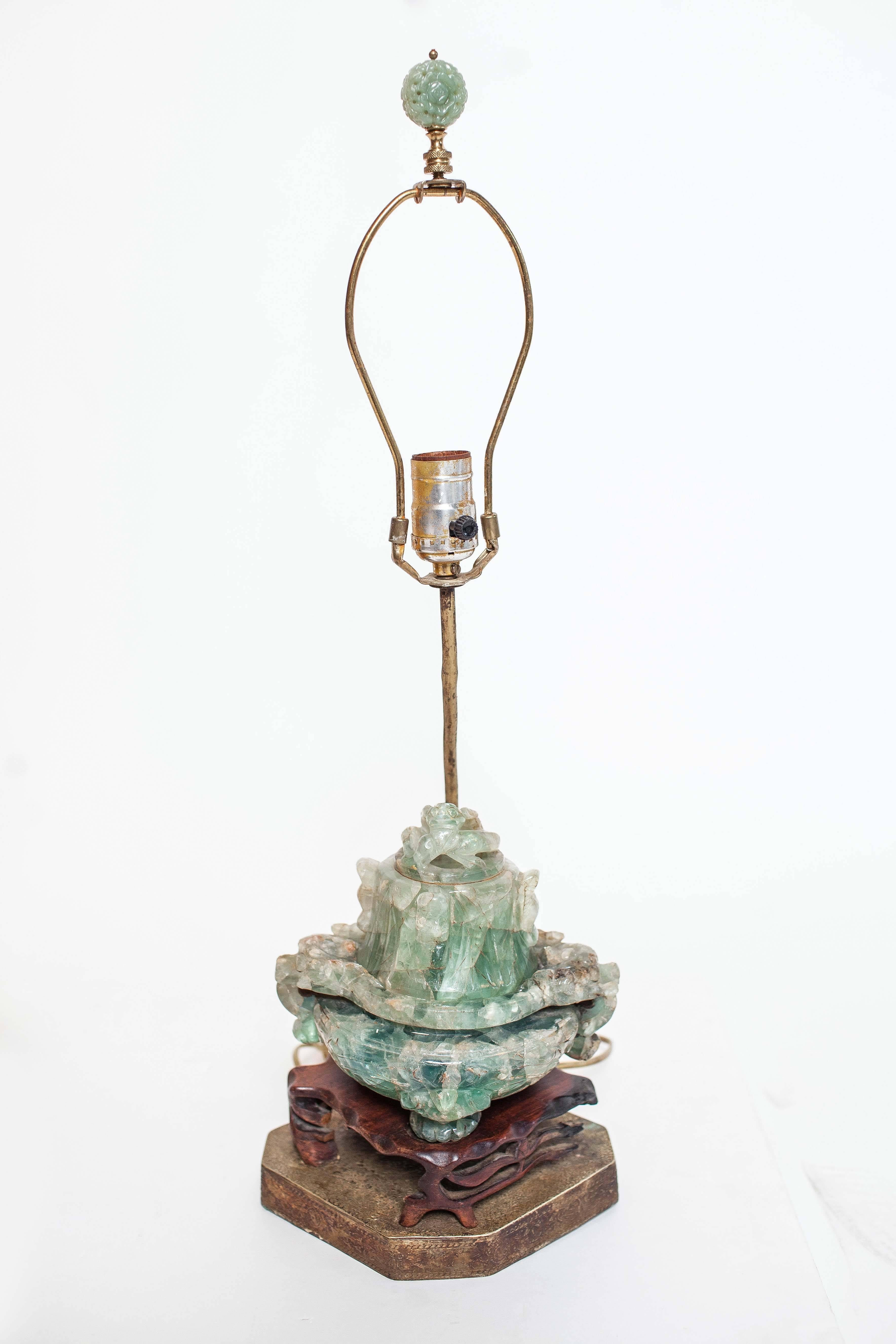 Pair of hand-carved quartz lamps were originally potpourri vessels that were converted to lamps in the 20th century. Mounted on rosewood bases. Removable lid.  Quartz finial.  