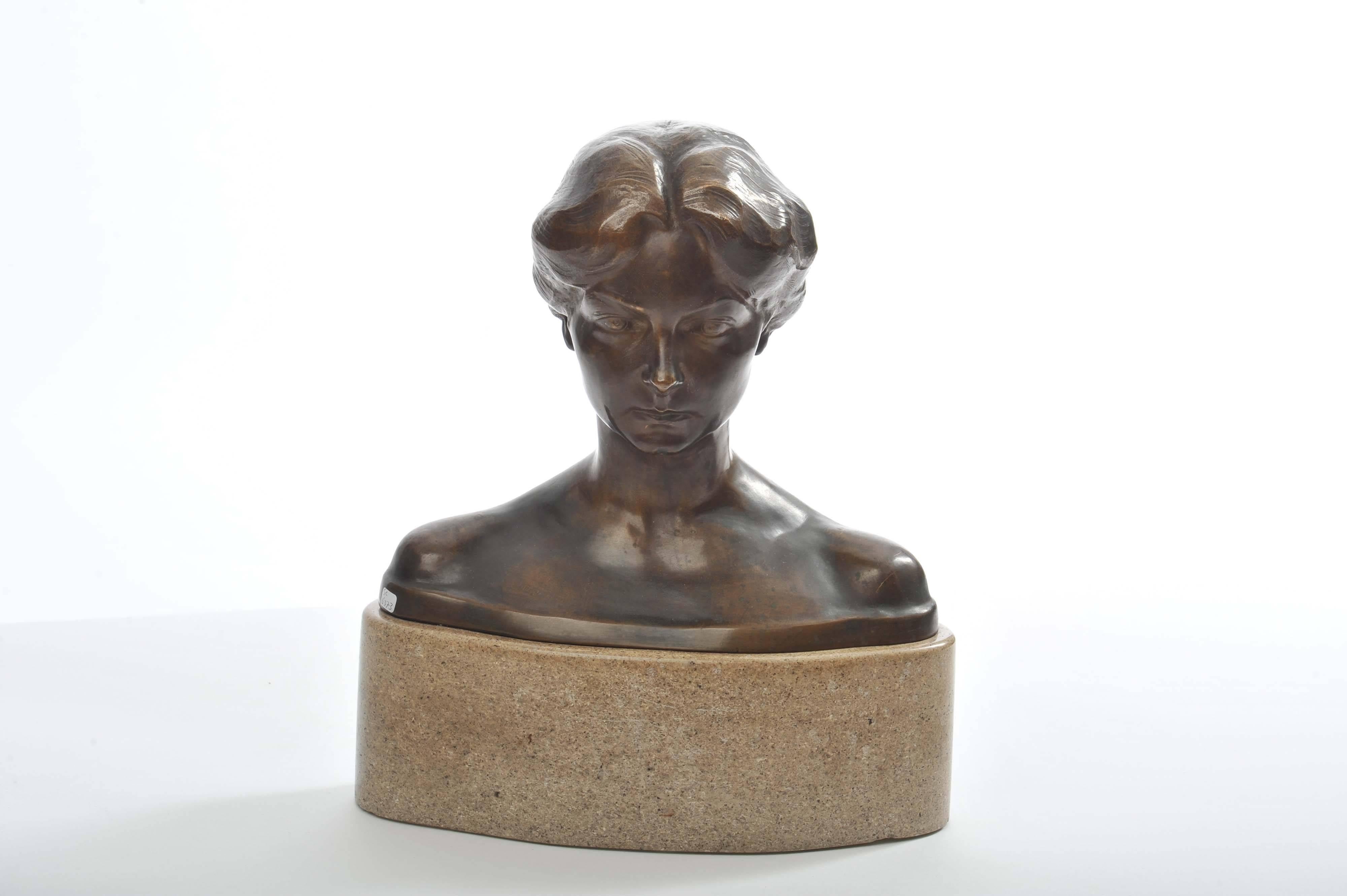 French bronze bust is placed on an oval granite base following the lines of the women's dress. The bronze has a good patina.
Signed Bory.