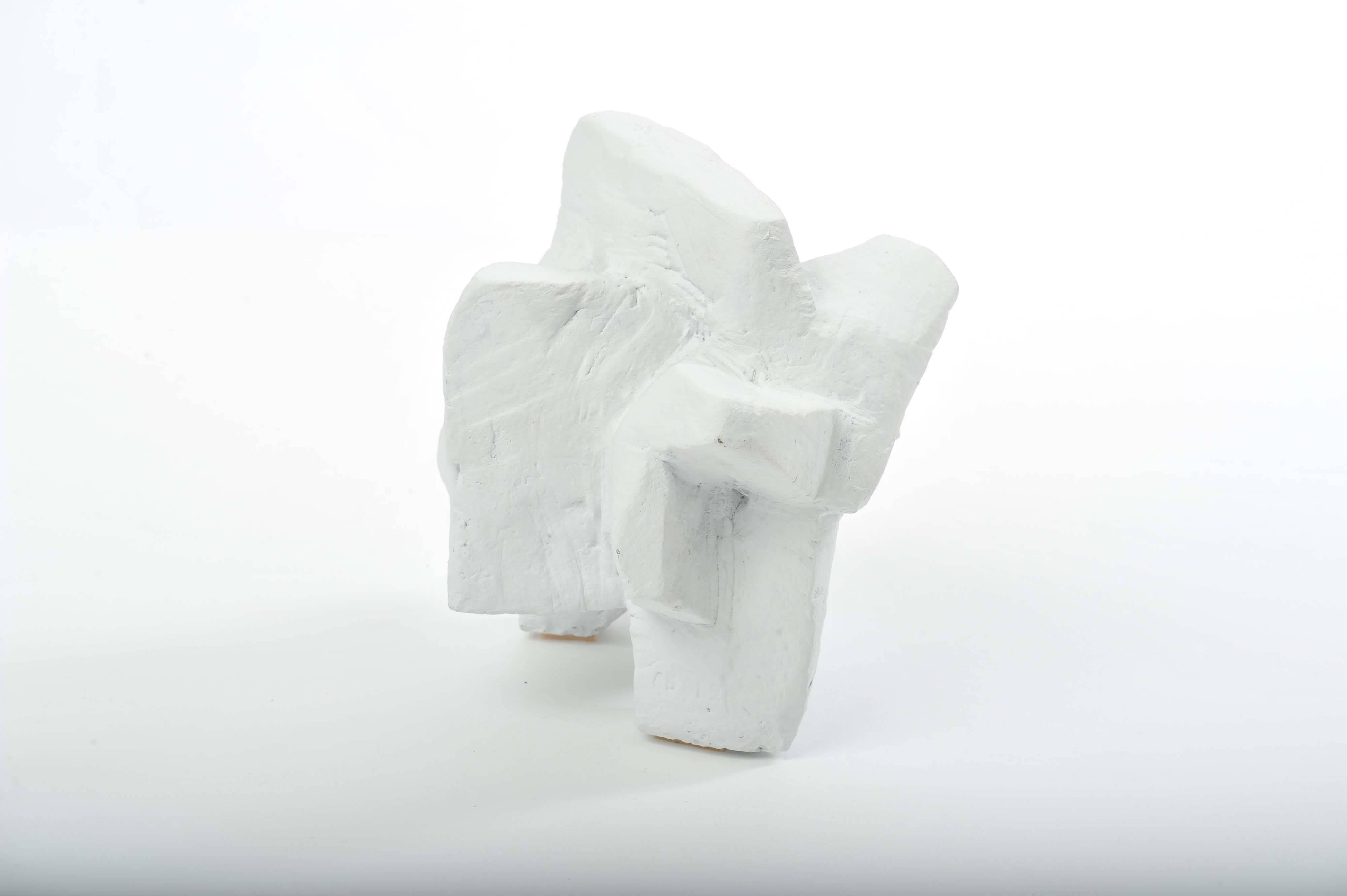 This hand formed ceramic sculpture looks like white cliffs on the British coast line. His work echoes a voyage of discovery in not just the visible natural world of trees, rocks but the city and Industrial landscape with his exploration of space and