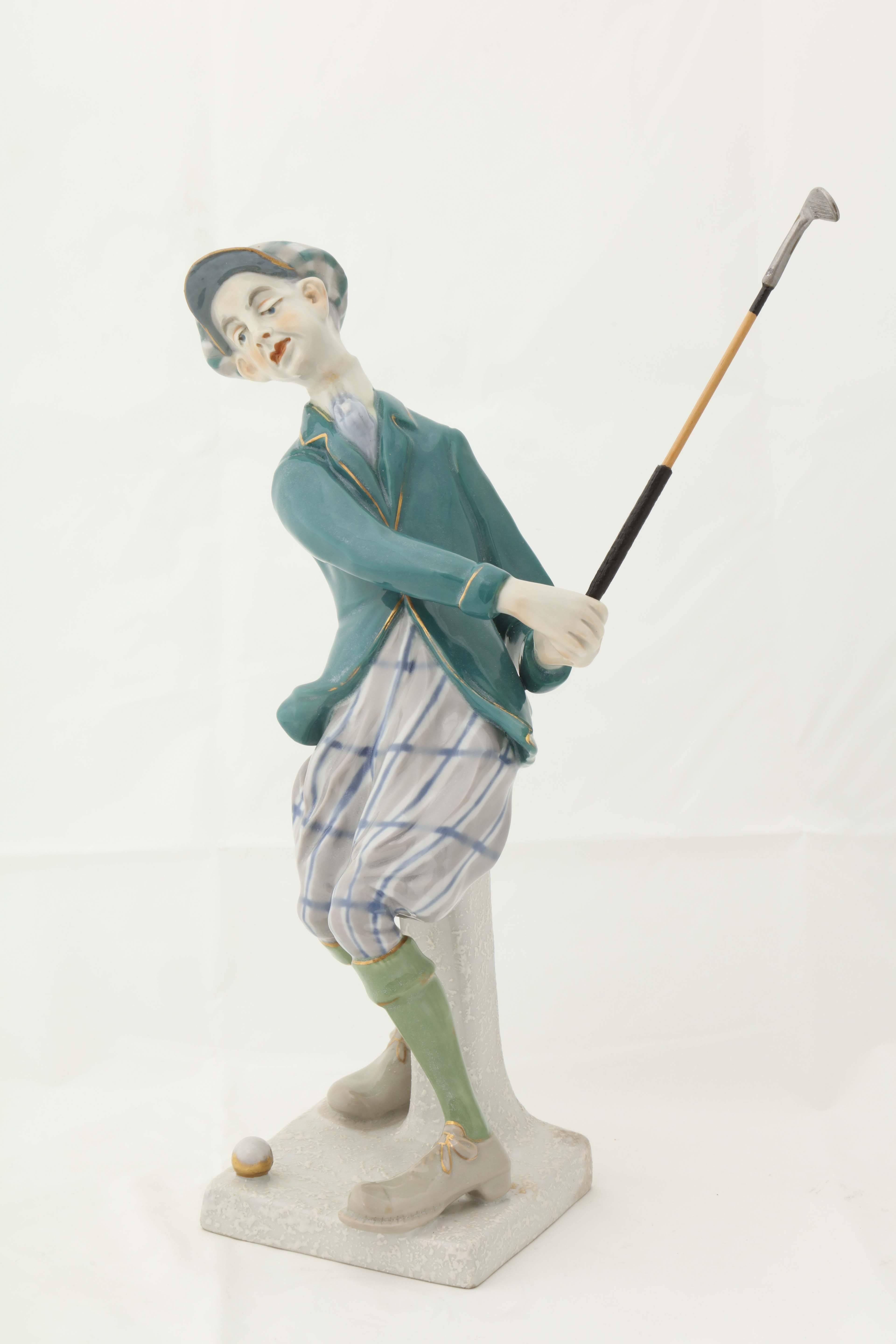 A Rare Ceramic Sport Caricature Figure beautifully glazed and
 wildly whimsical. Mint Condition. Make with the Amphora Oval Mark, the Amphora Crown, Imperial Amphora Czechoslovakia mark,
impressed 5017 /  1.

