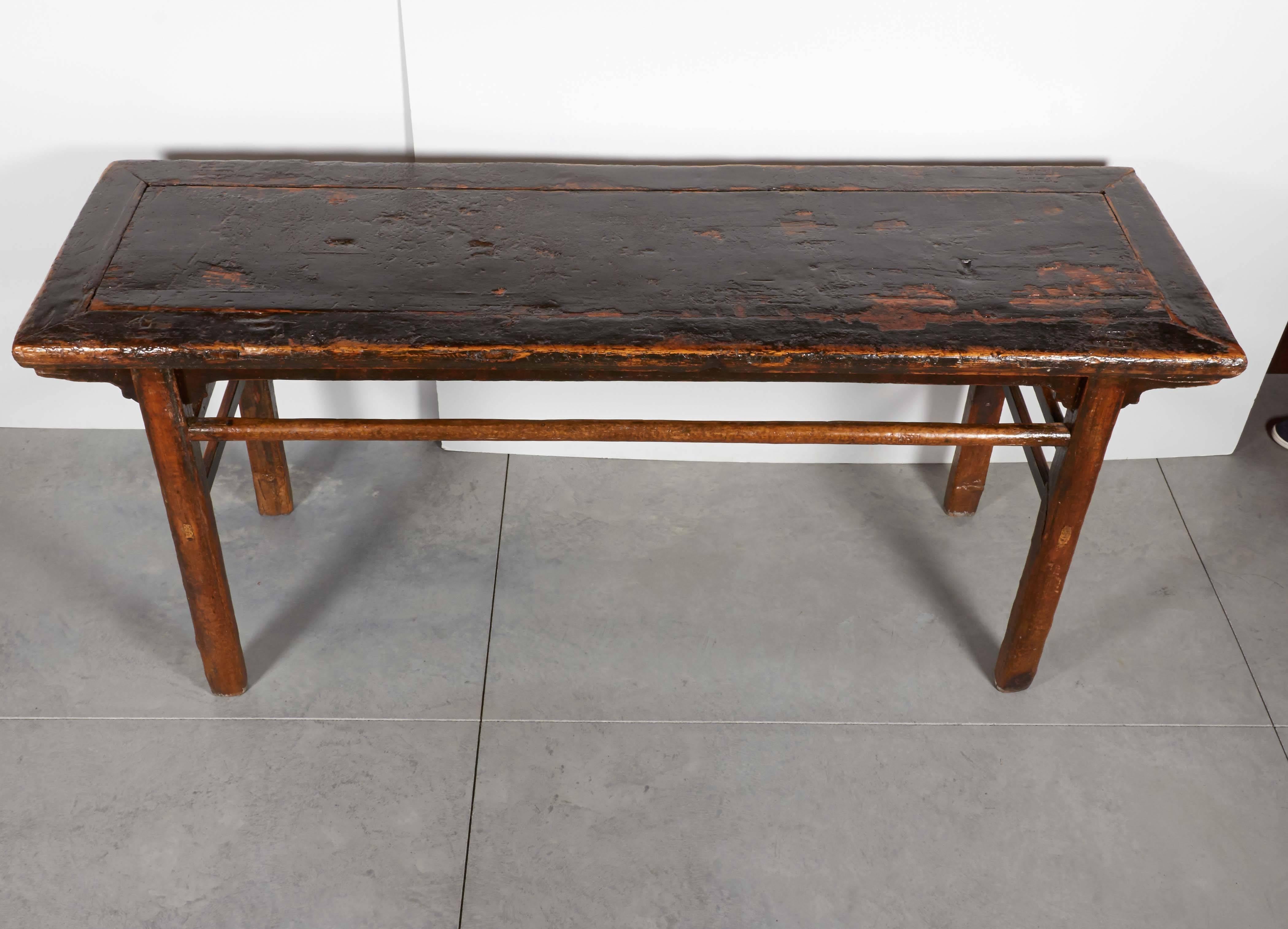 A perfectly distressed and heavily lacquered antique Chinese painting table with an incredible patina and simple, clean design. Excellent country piece that shows it's age beautifully. From Gansu Province, circa 1880.

T592.