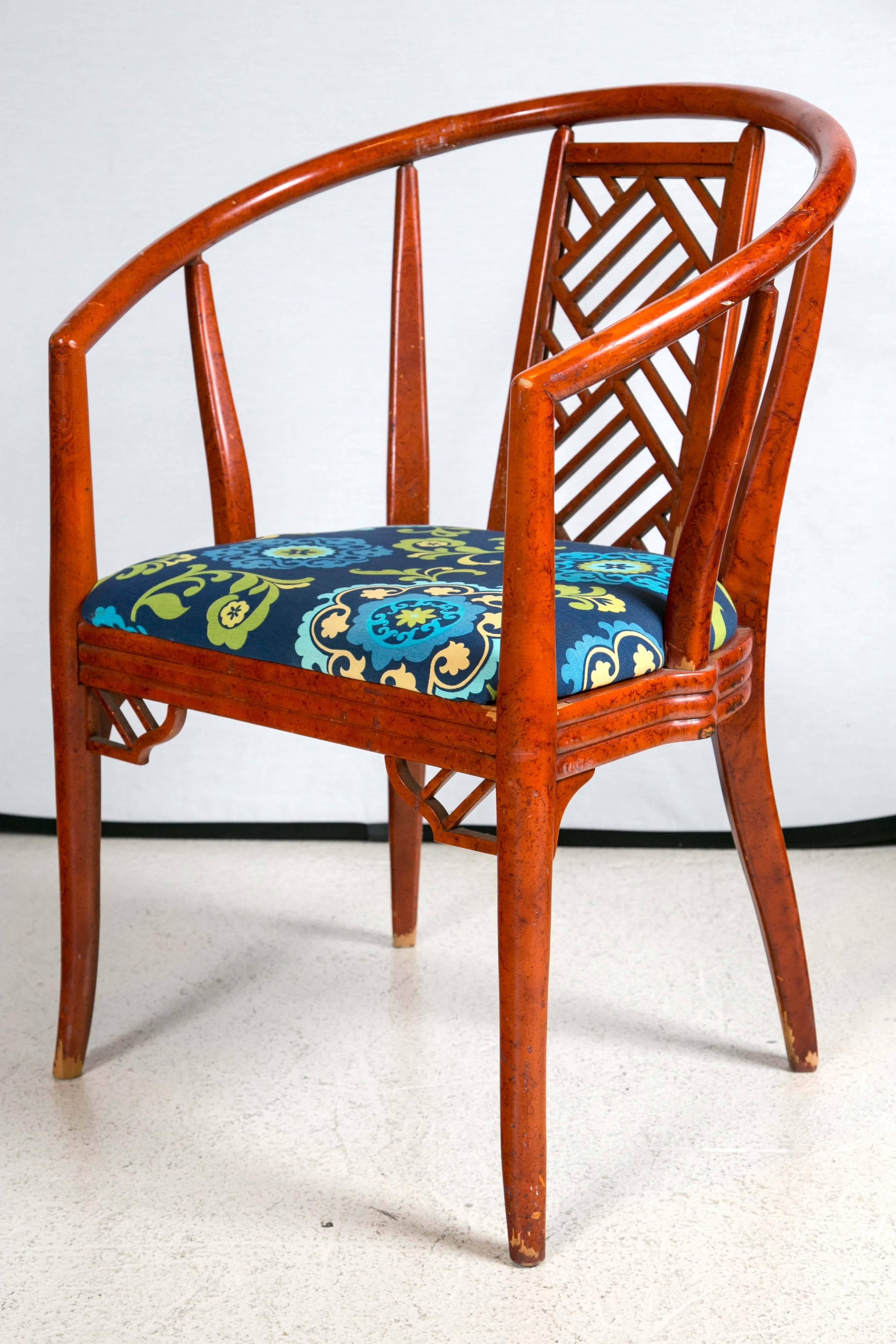 Pair of 1960s painted wood armchairs with intricate fret-work design.