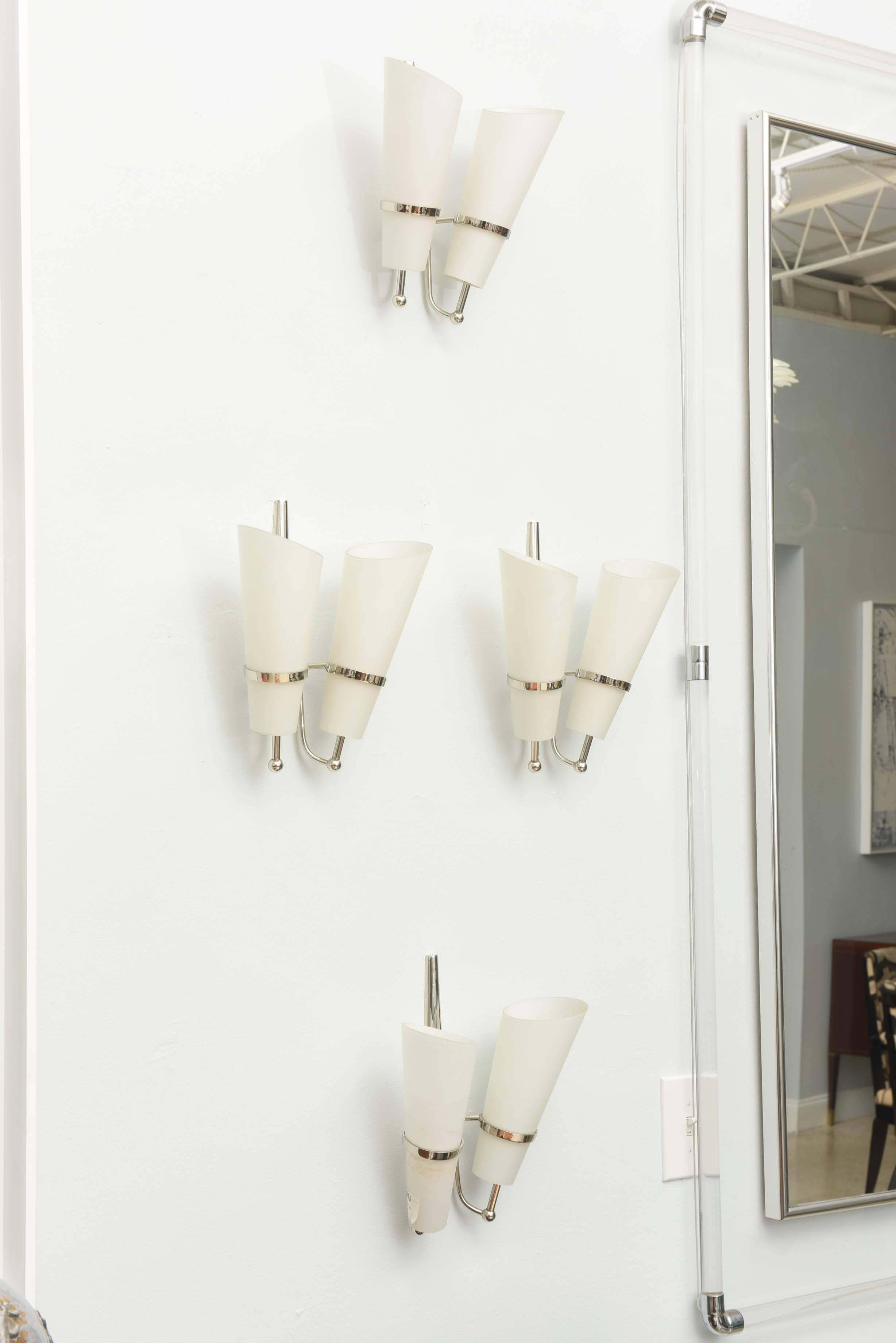 Mid-Century Modern Set of four Italian Modern Nickel and Glass Wall Lights, Attributed to Stilnovo
