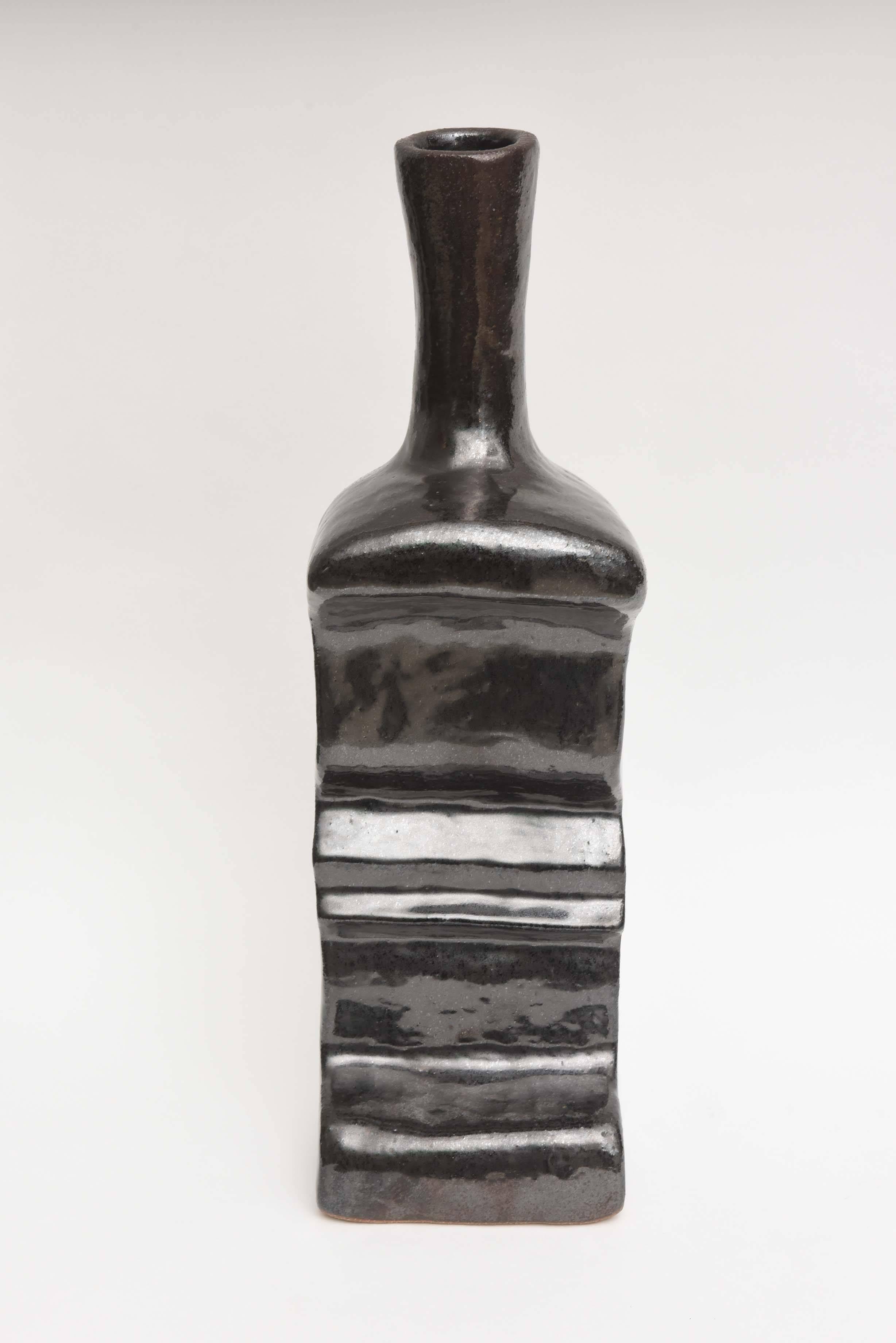 Large black glaze ceramic by California artist/ceramicist Daric Harvie signed.