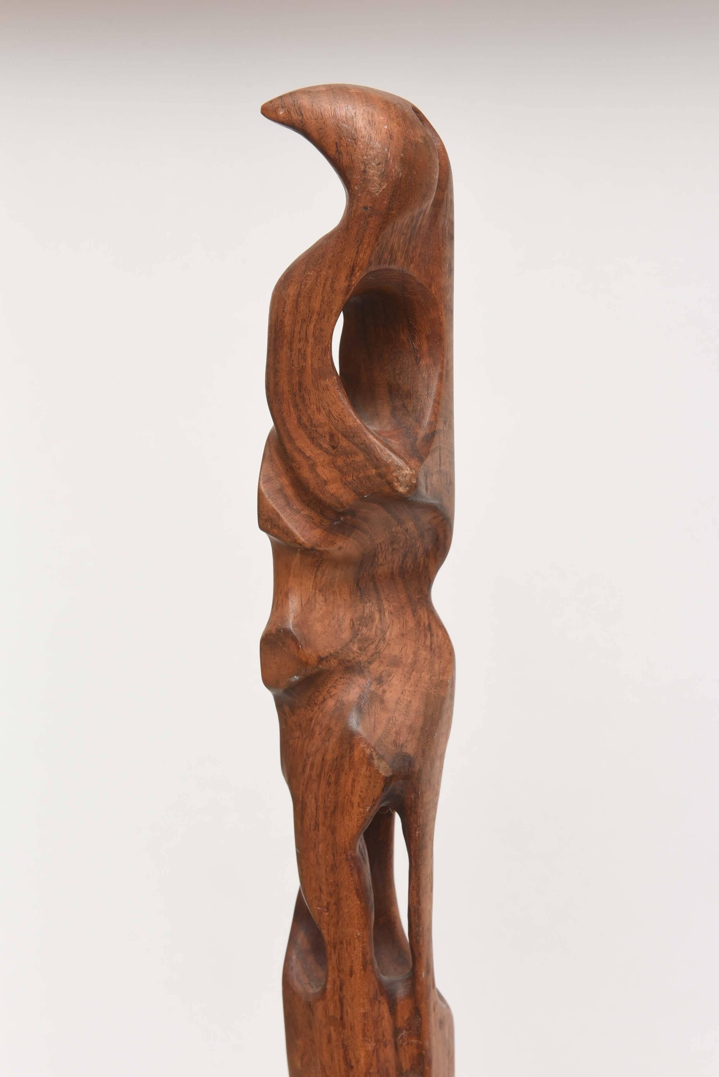 Overall carved in walnut, be renowned Argentine artist Raul Varnerin, signed.