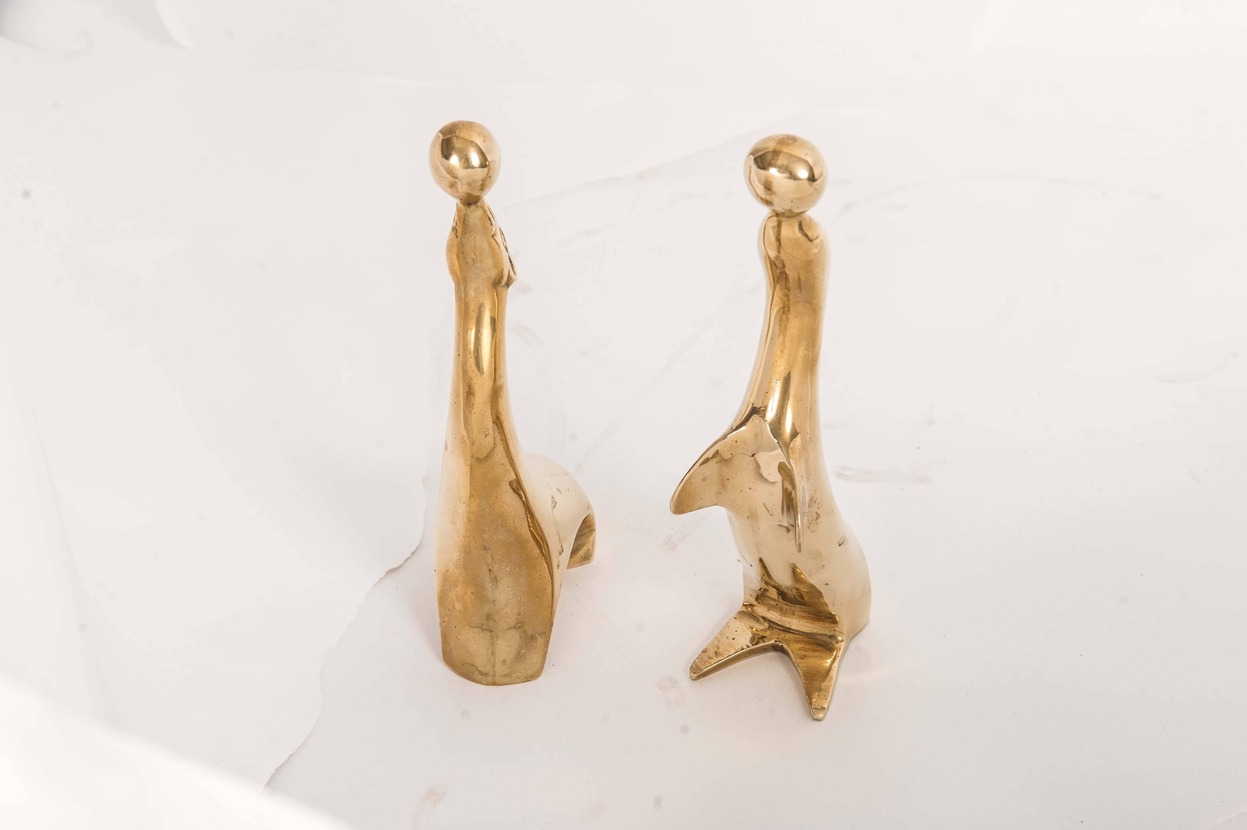 Very decorative set of two seals made of brass.
These midcentury friends are both playing with their own ball in a nice stylized shape.