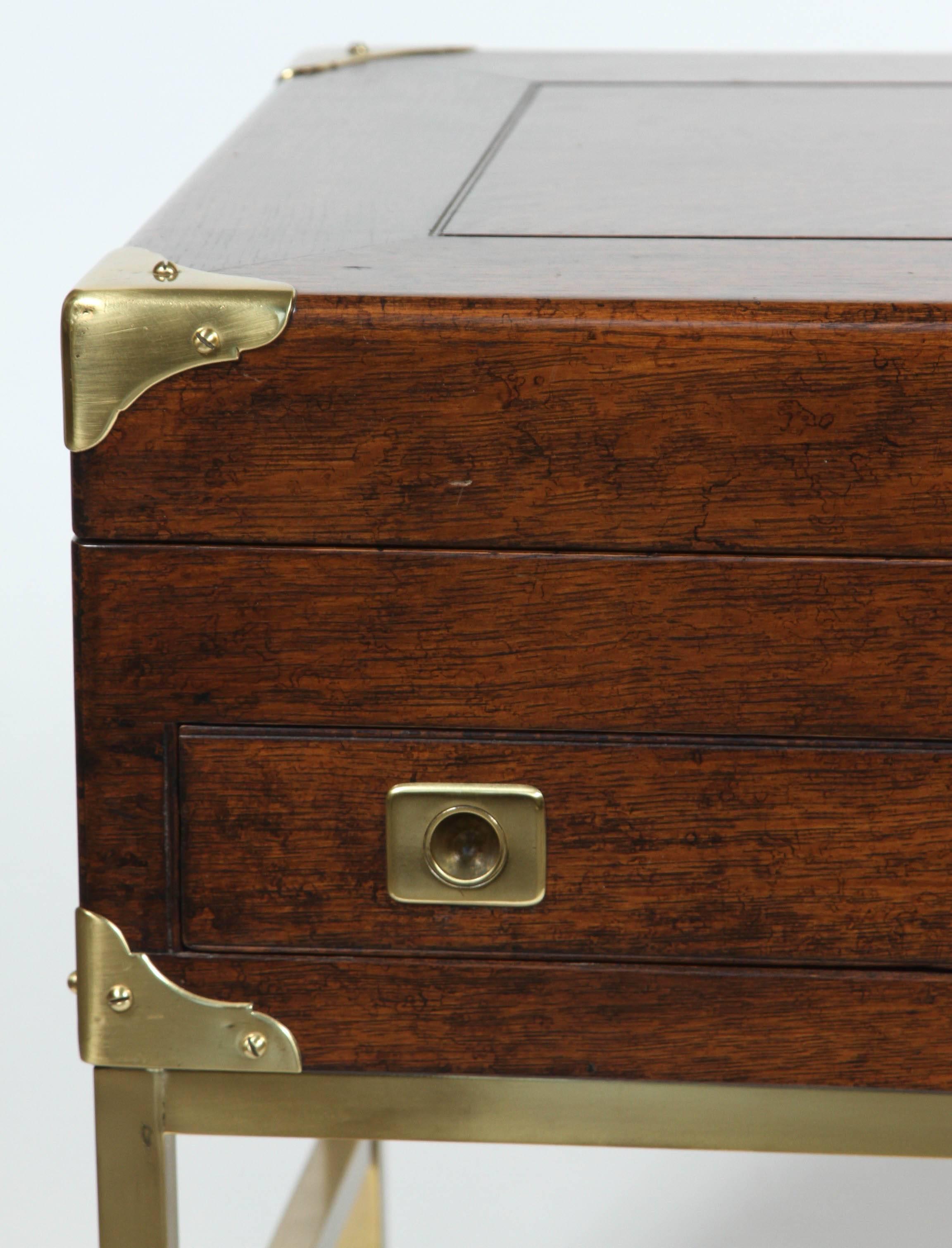 An English brass bound oak silver chest, late 19th century with later custom brass stand. It makes a wonderful end table.