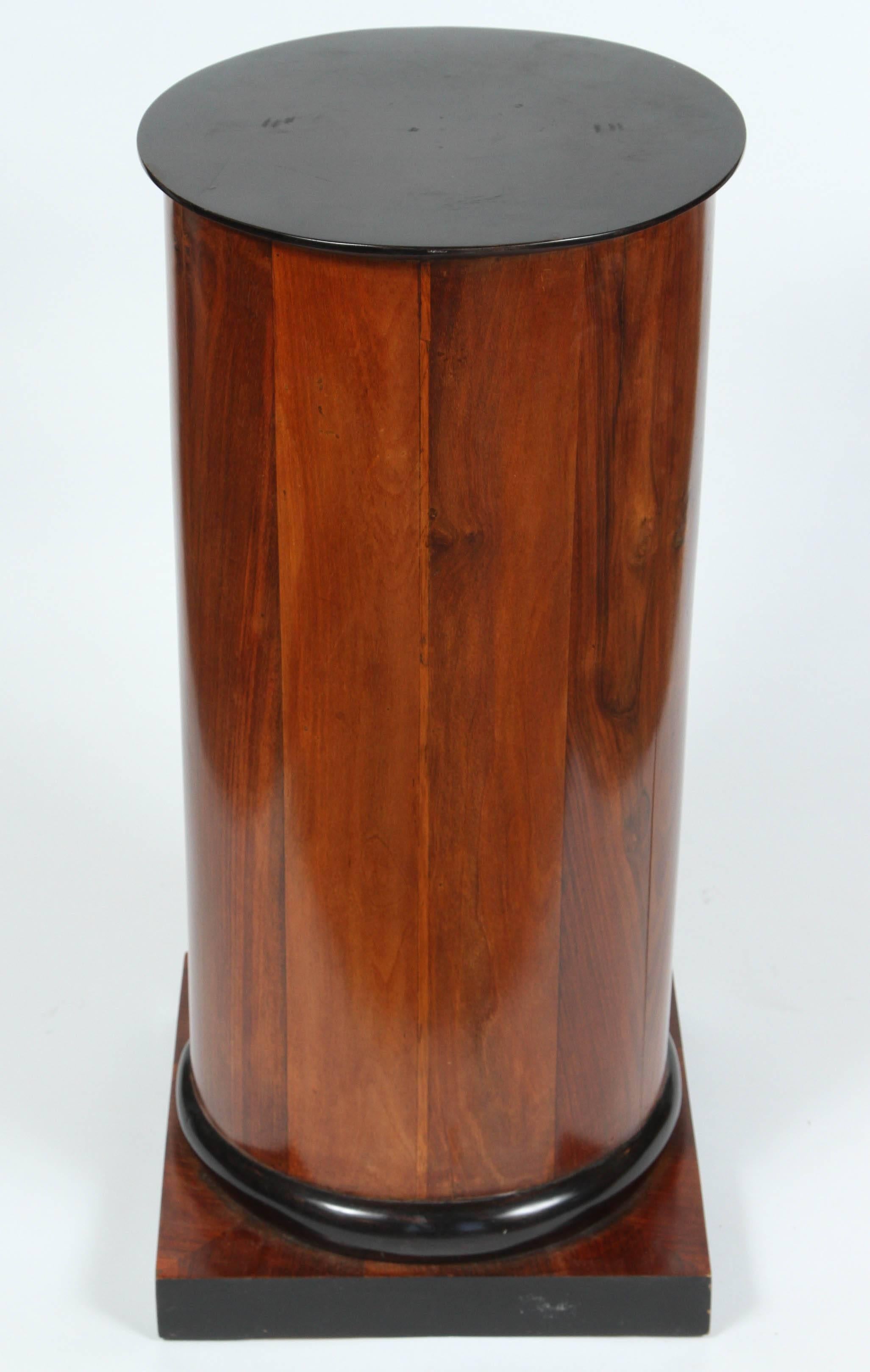 A Walnut and Ebonized Wood Biedermeier Cylindrical Pedestal Cupboard 2