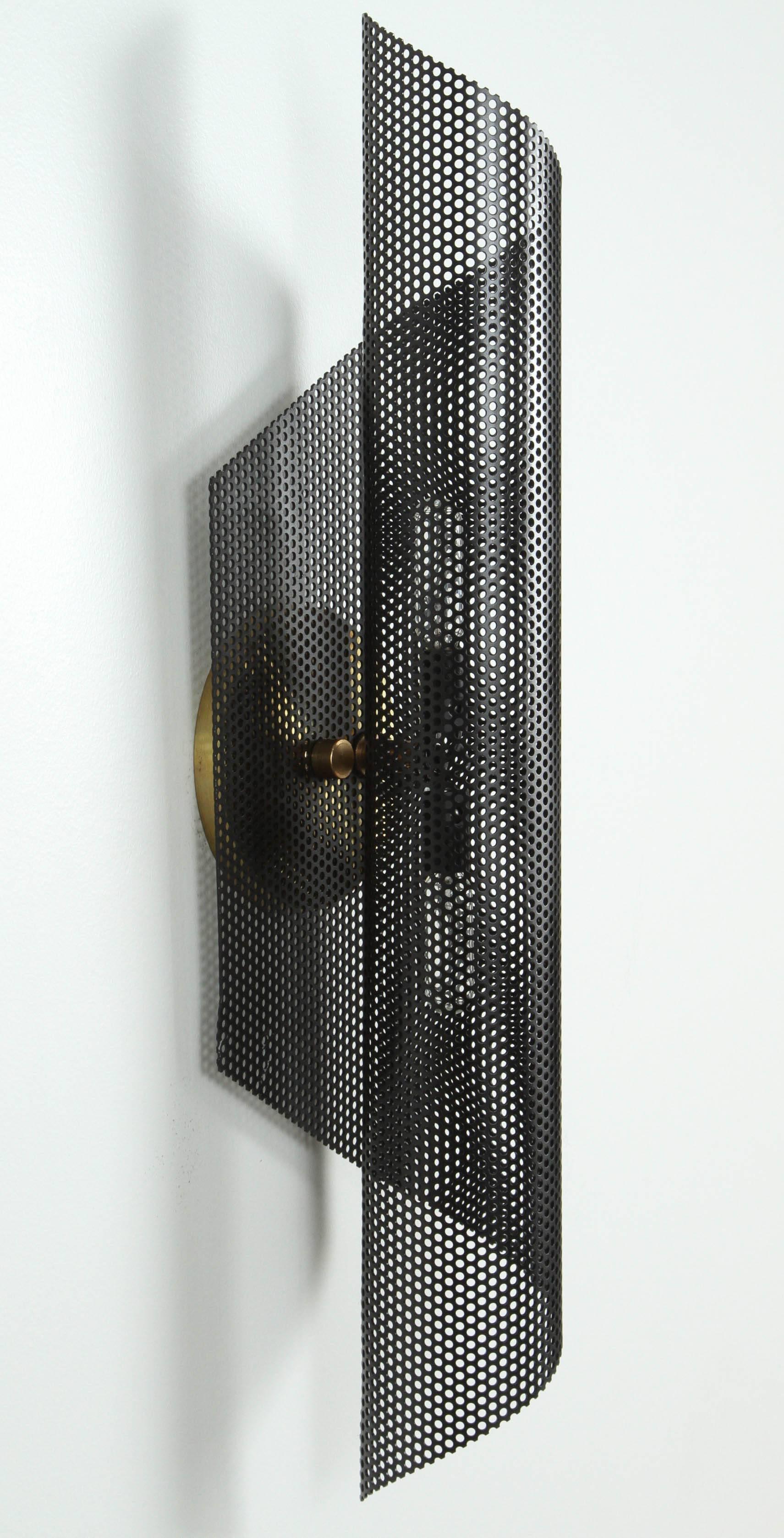 Rolled perforated sconce by Lawson-Fenning. In stock. Available to order in white or black with a 6-8 week lead time.