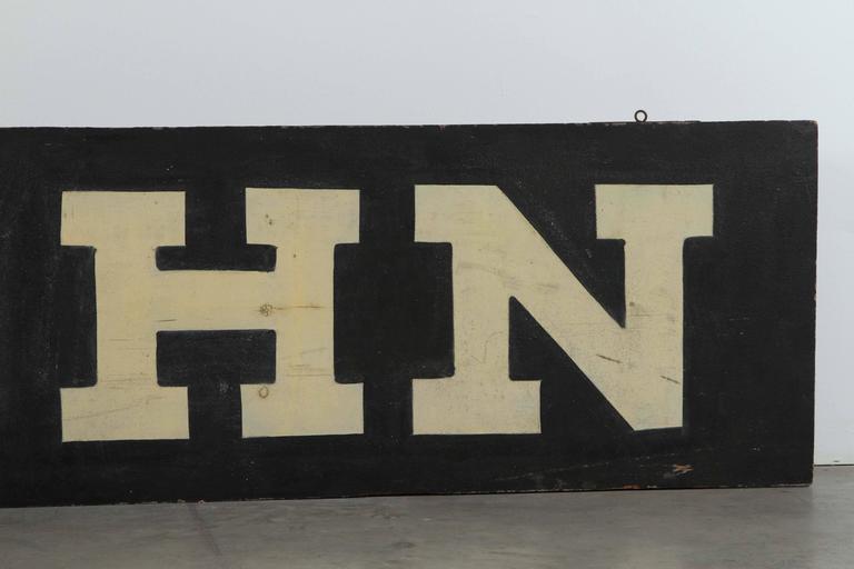 Late 19th century original sand and paint surface "JOHN" sign.