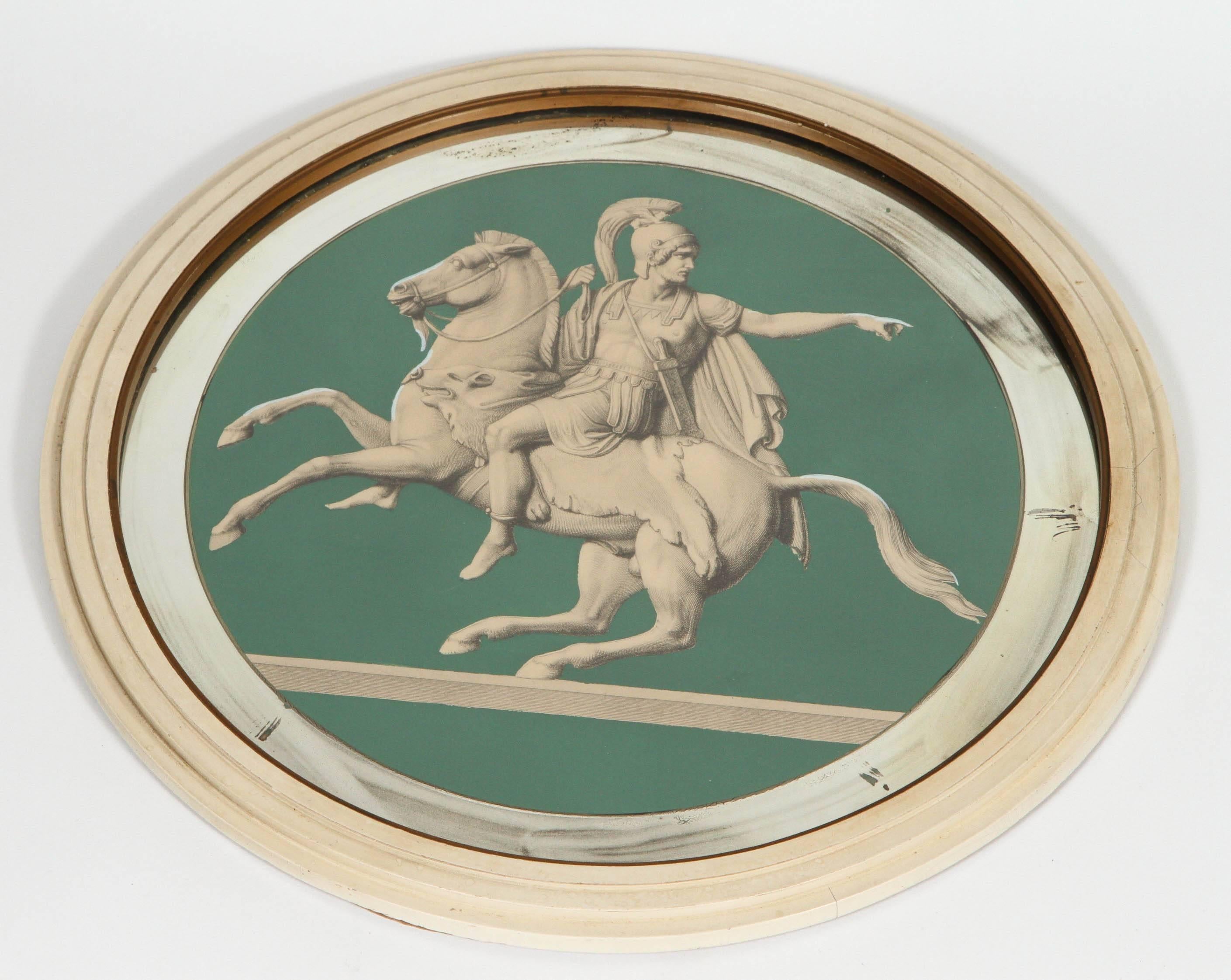 Pair of vintage Greek soldiers on horses in round frames with mirror border.