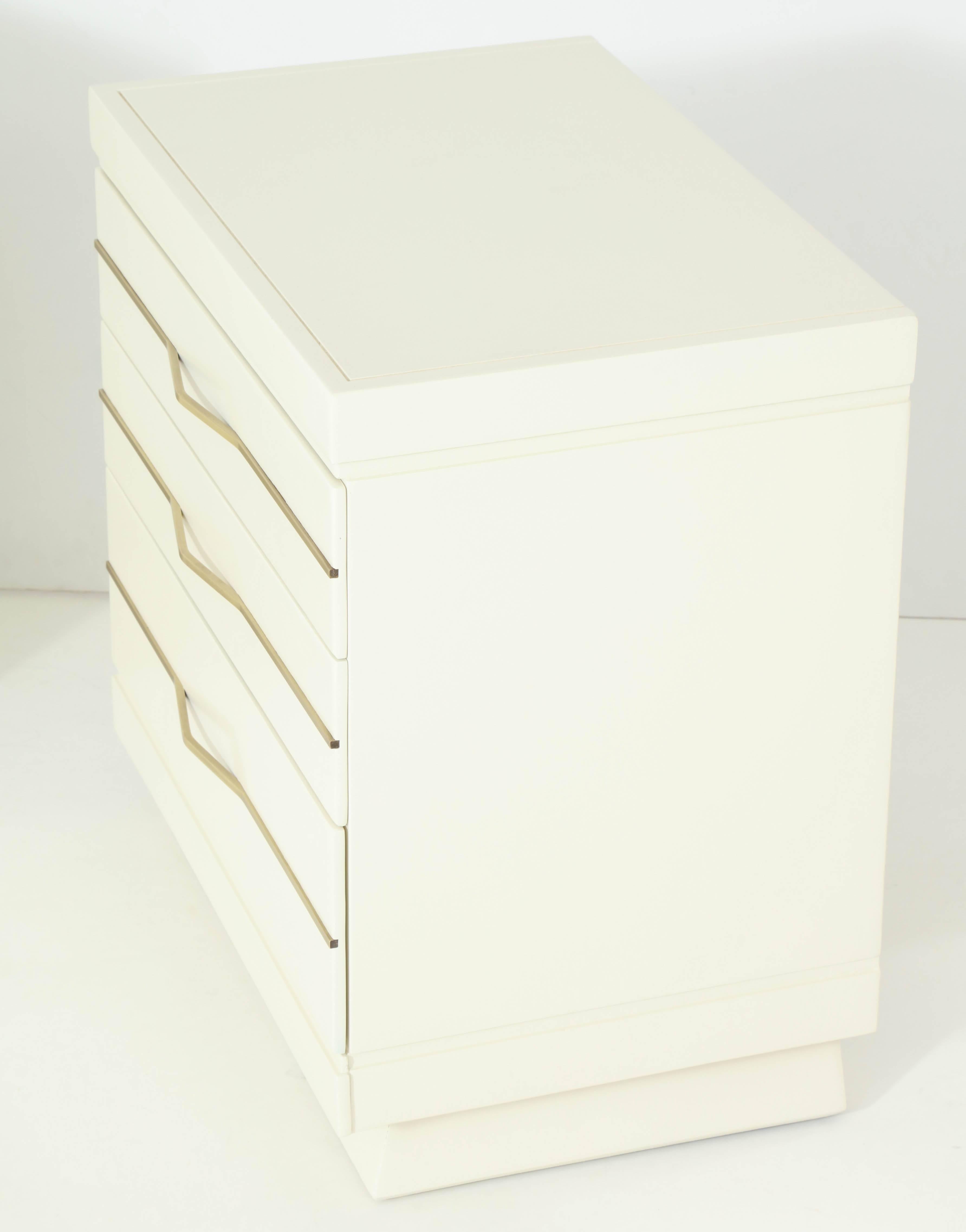Sleek 1950s Ivory Lacquered Chests with Brass Bar Hardware 4