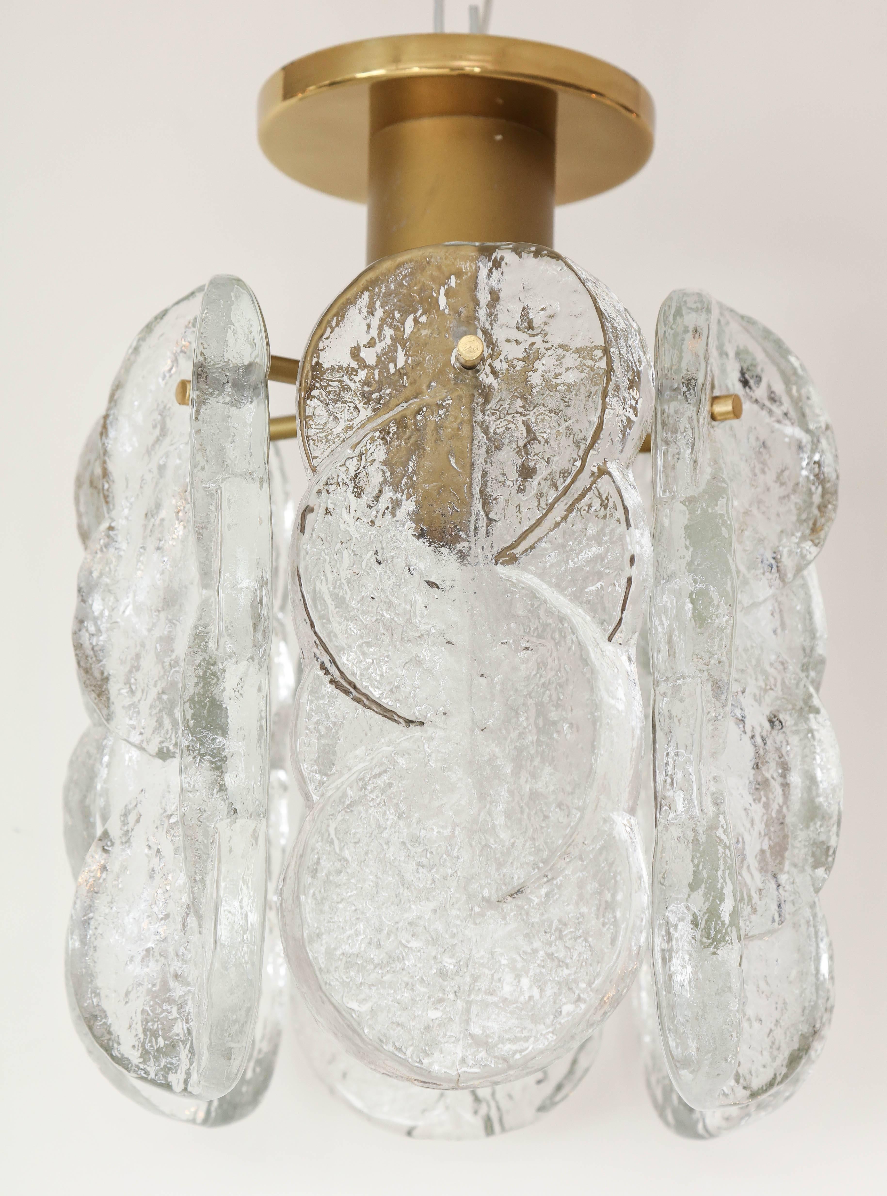 Modernist flush mount chandelier featuring six braided ice glass elements suspended from a brass frame. Utilizes one standard type bulb, rewired for use in the USA.