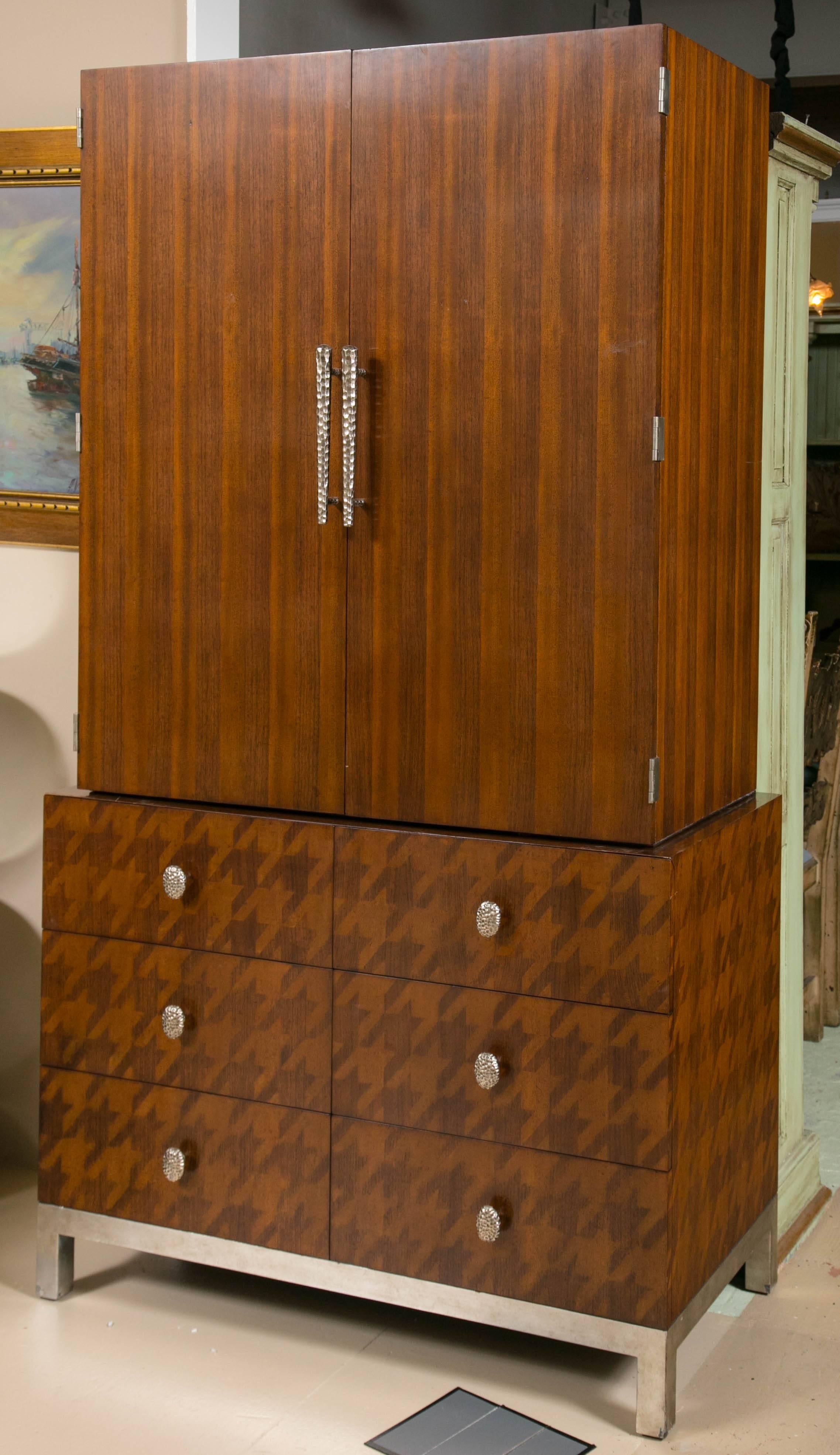 Alexander Julian for Jonathan Charles. Hitting the bar. This finely designed bar cabinet has a lower commode of three by three lined drawers on a silver base supporting an upper fabulous wine rack bar/cabinet with beveled mirror back and glass
