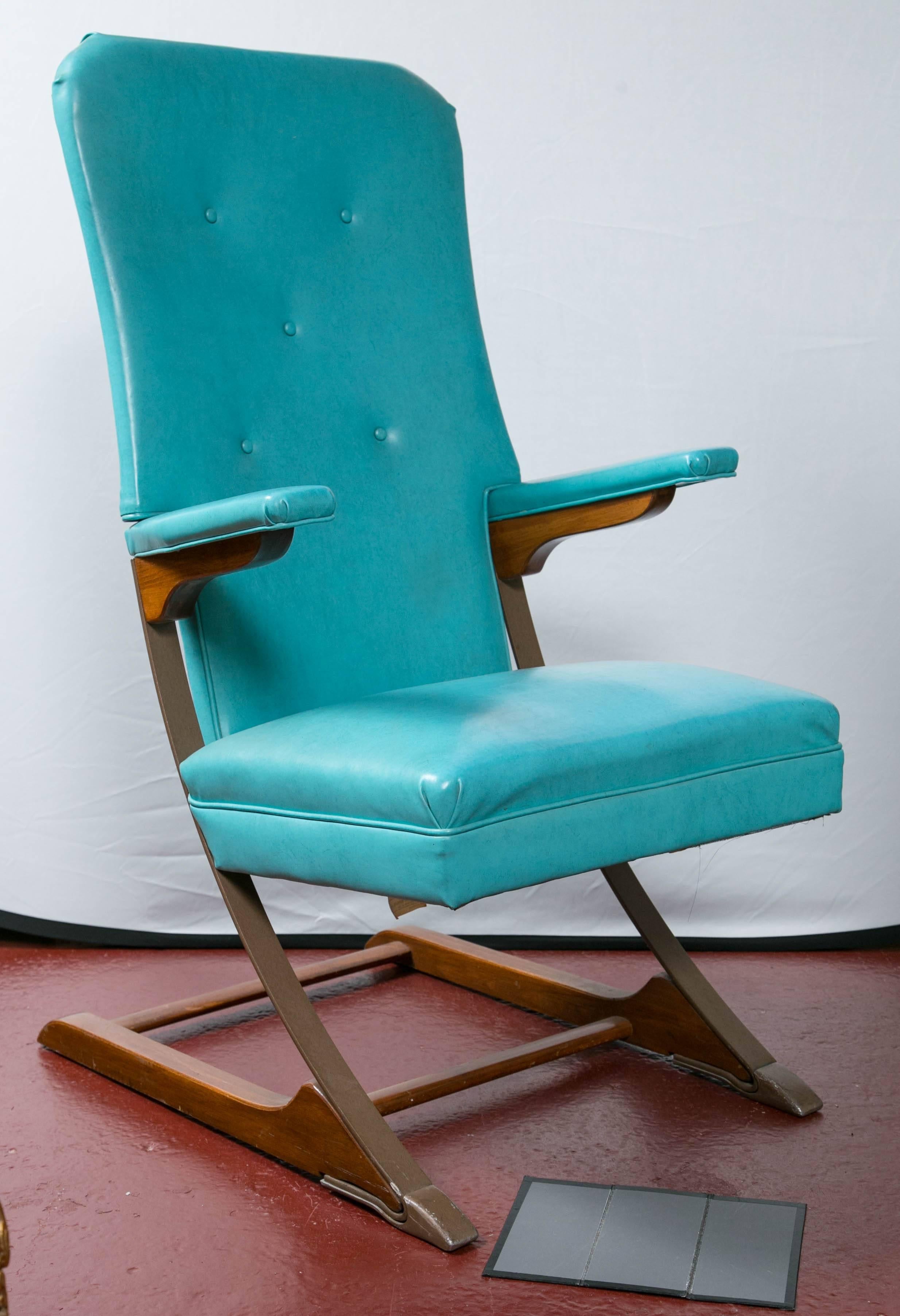 Set of six blue padded dining chairs, can buy one or all. Vintage Mid-Century cantilever rocker by designer McKay. This 1950s, 1960s rocker is a rare and wonderful piece! The frame is a combination of steel and wood and the rocking motion is just