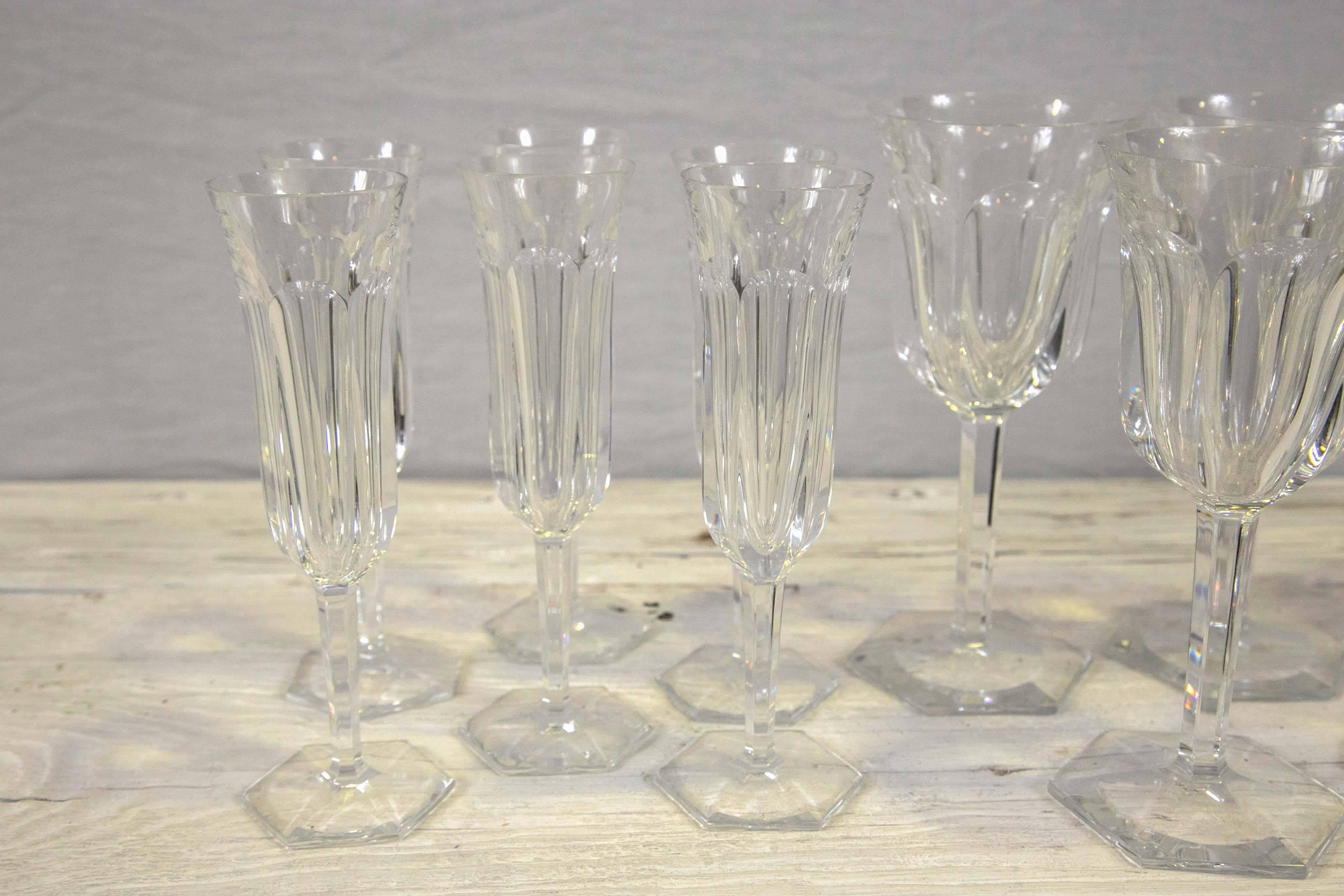 Set of eight goblets and six flutes perfect condition. Mark on bottom of stem.
