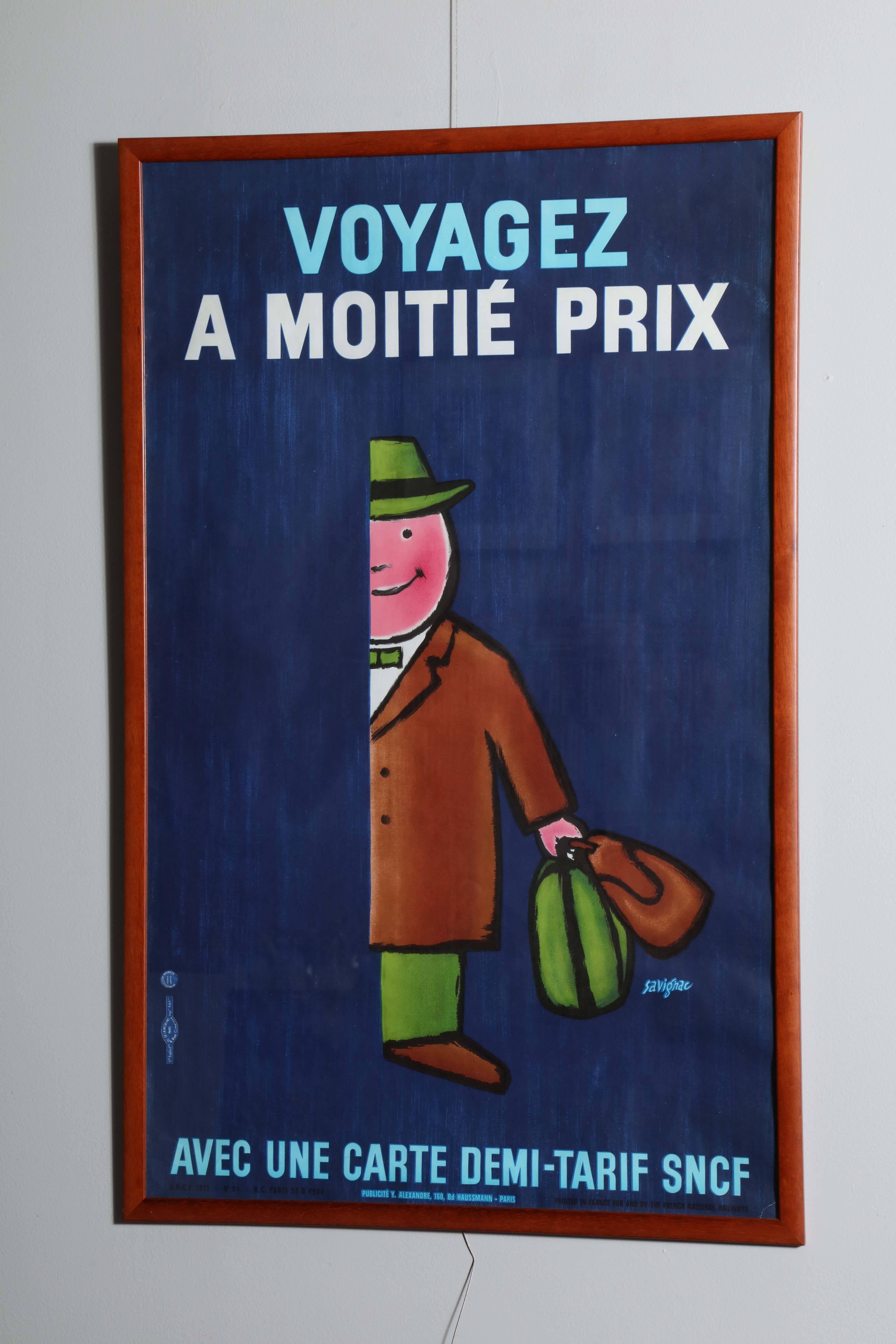 A framed vintage French poster.
Translation: Travel at half price with a half price card. Humor obvious.