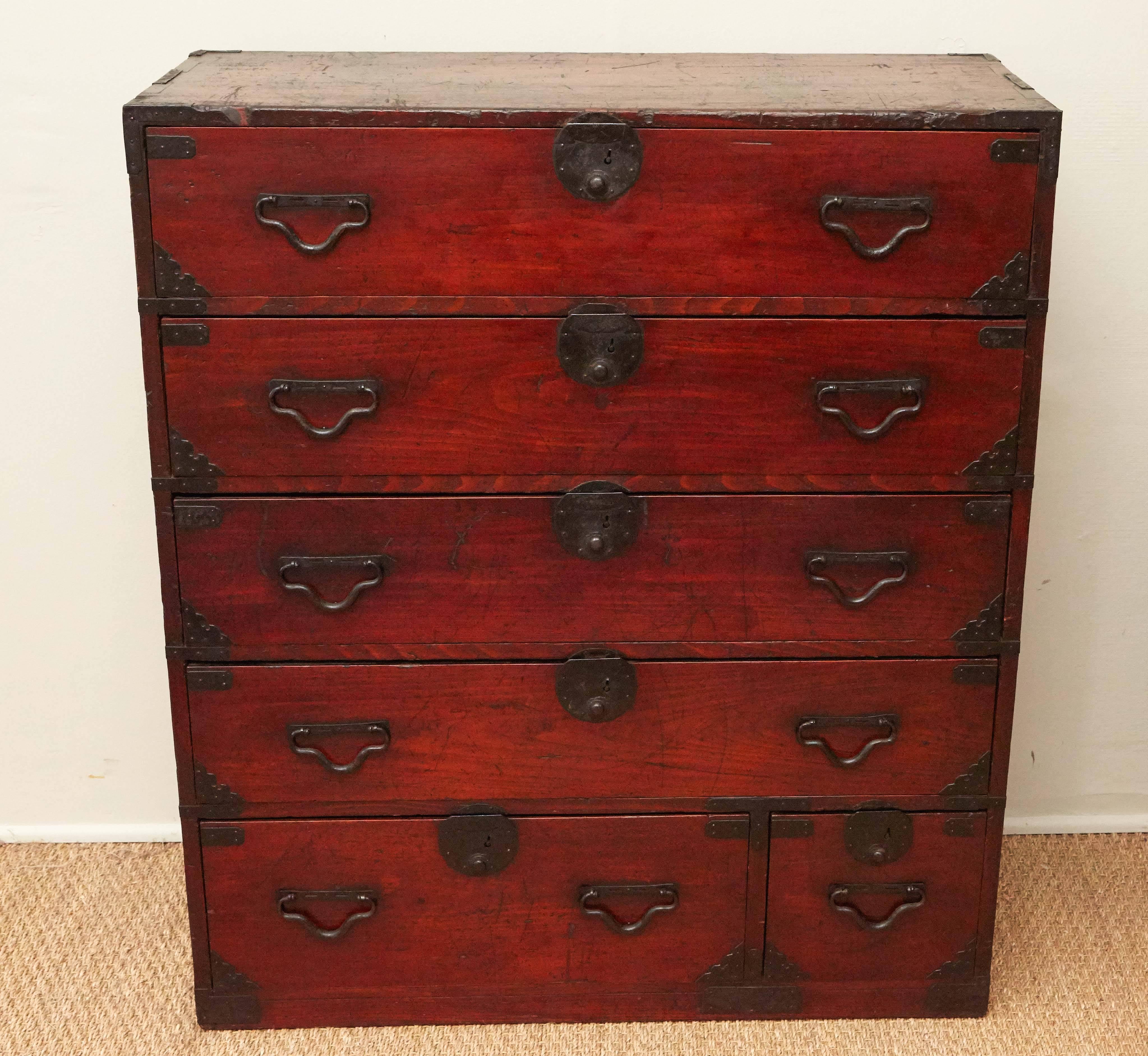 Early 20th century cedar wood Kimono Tansu with five levels, six drawers (two on bottom as shown).  Some age appropriate wear.
