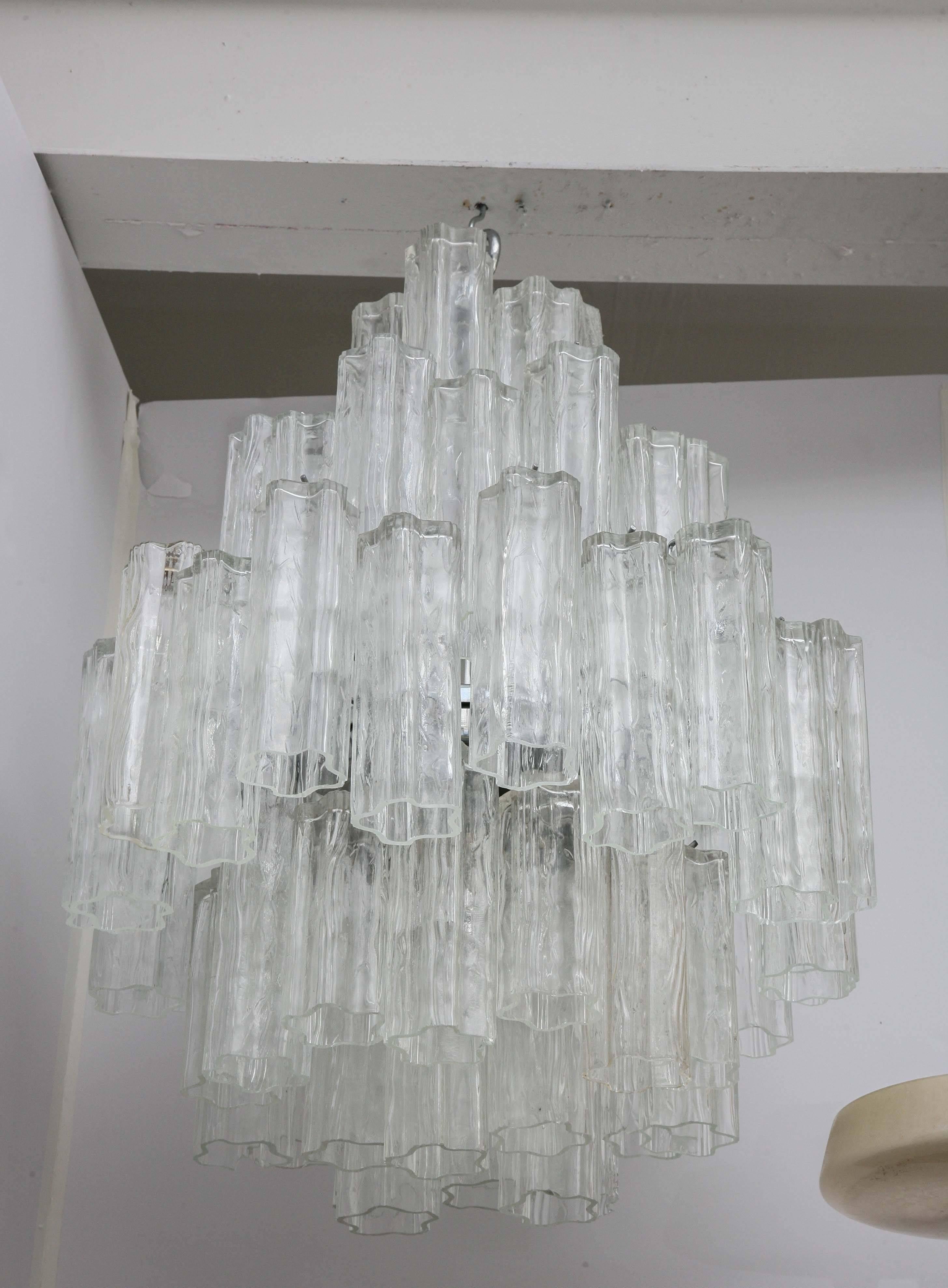 Oversized large four-tier chandelier by Venini. Murano, Italy, 1960s.