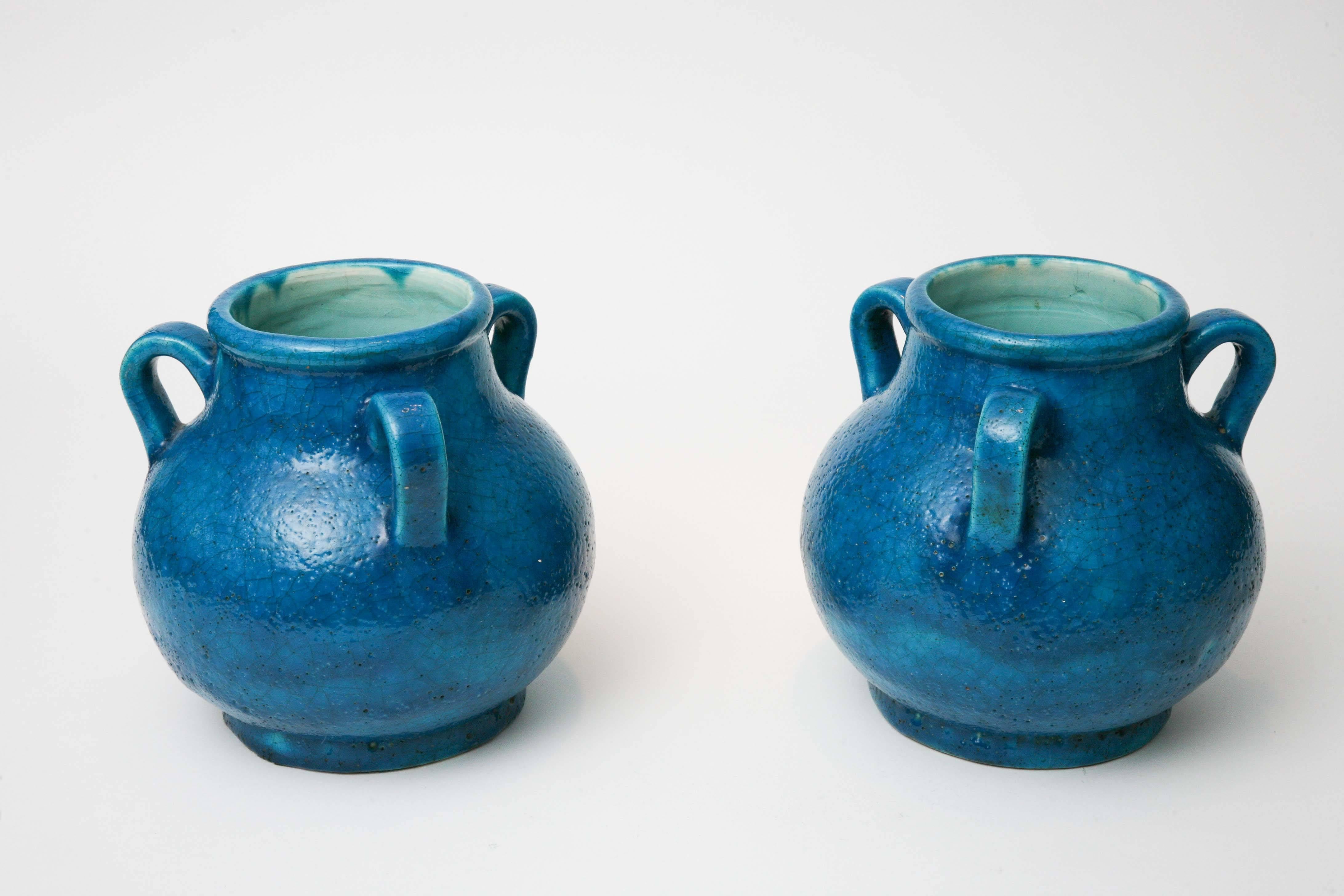 This attractive pair of faience vases are in the manner of Edmond Lachenal but are labeled simply 