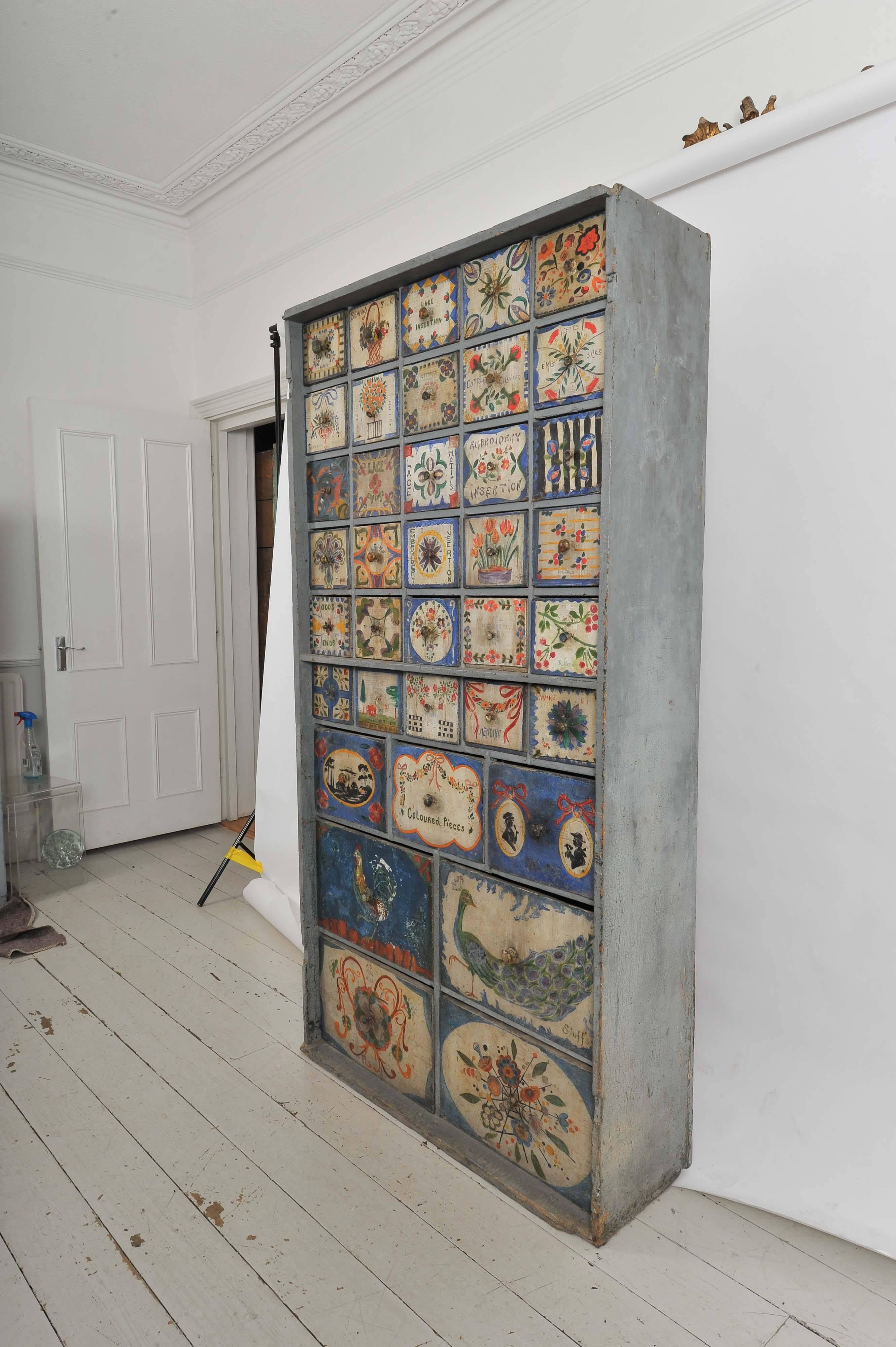 English 19th Century Haberdashery Cupboard with 37 Unique Hand Painted Drawers