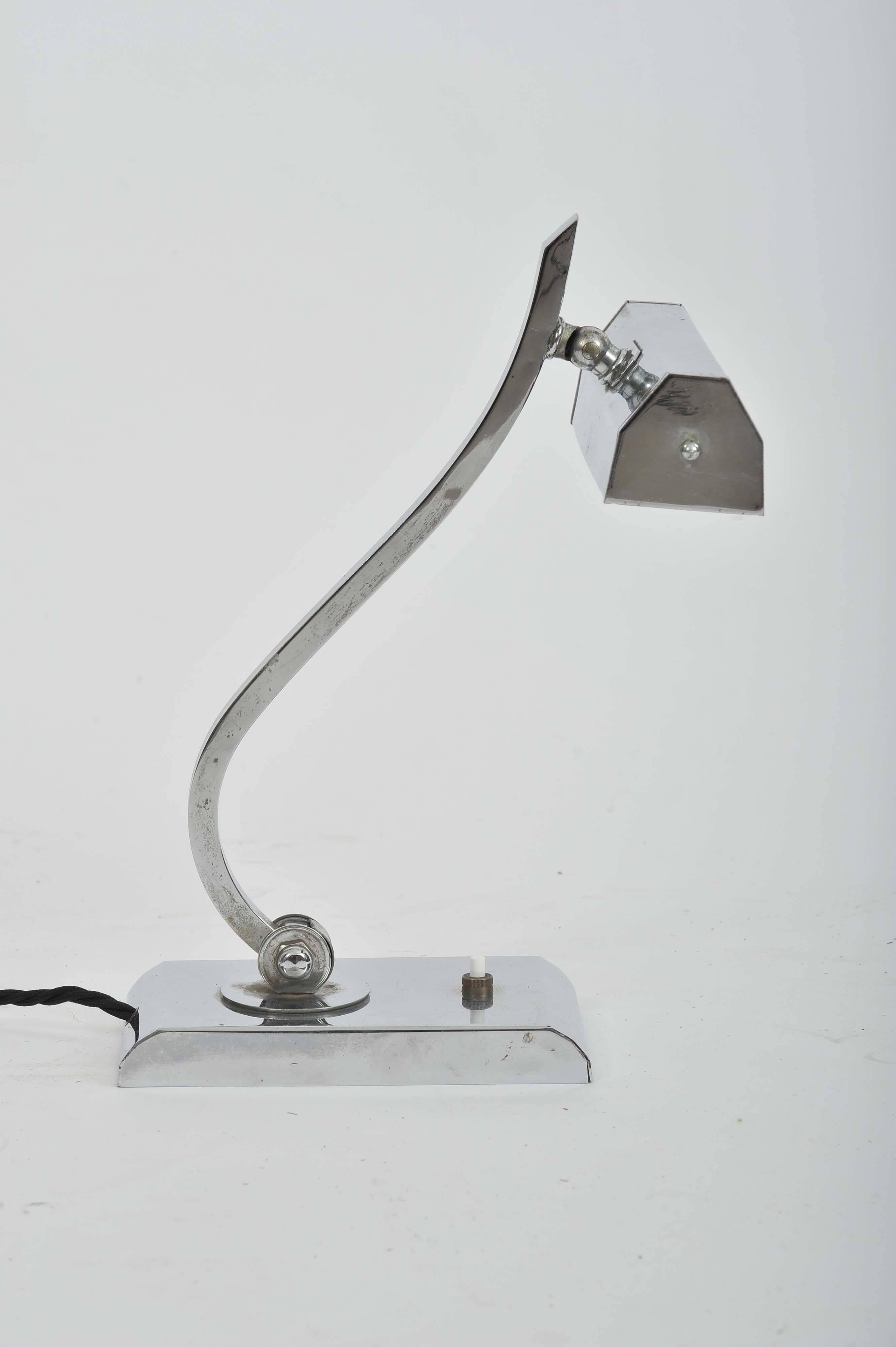 A charming deco chrome table light. Fully rewired.