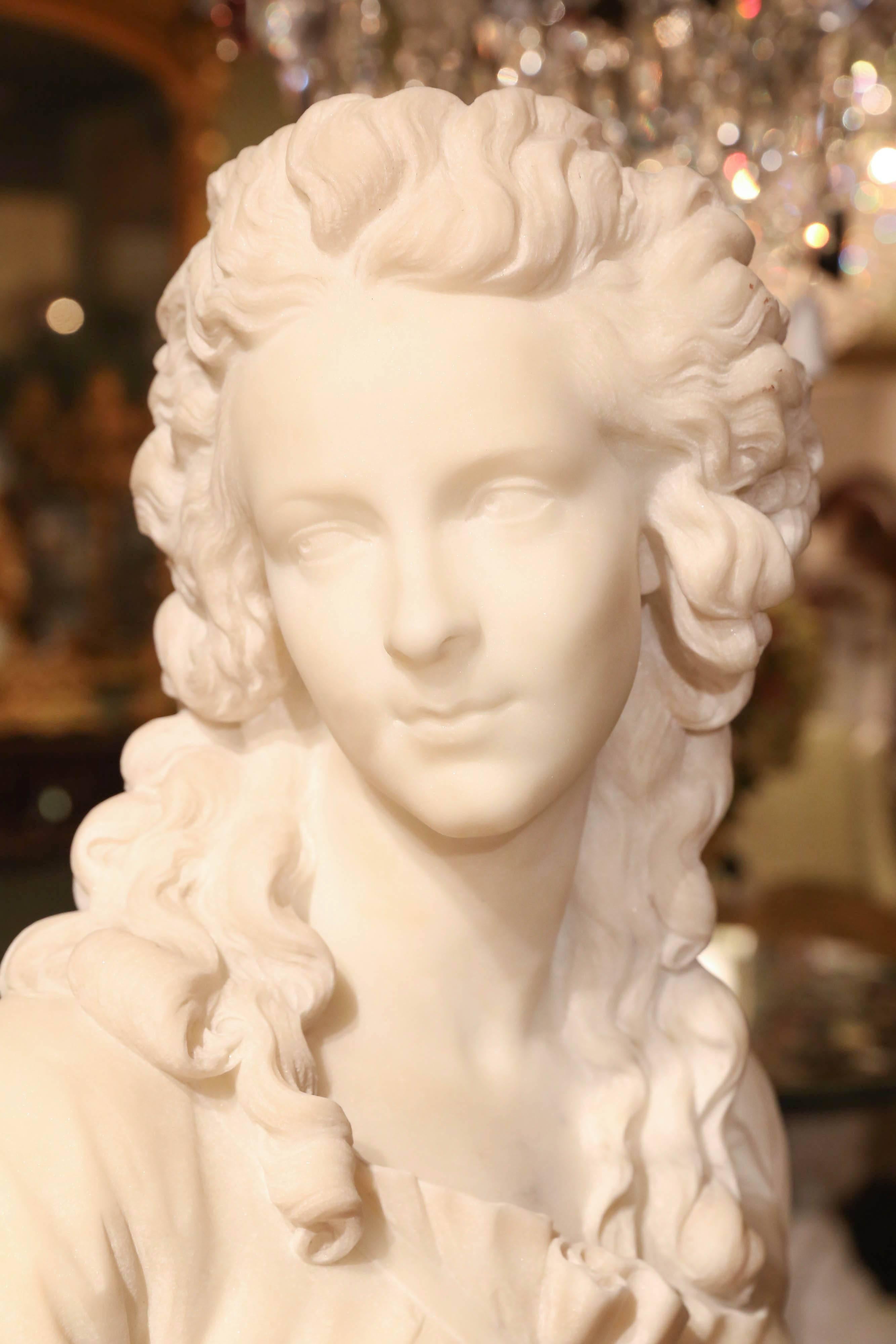 White Carrara marble bust of a French woman, 19th century.
Beautifully carved face with lovely features and long hair.
