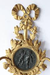 Pair of French 19th Century Gilt Bronze Two-Light Sconces with Patinated Bronze