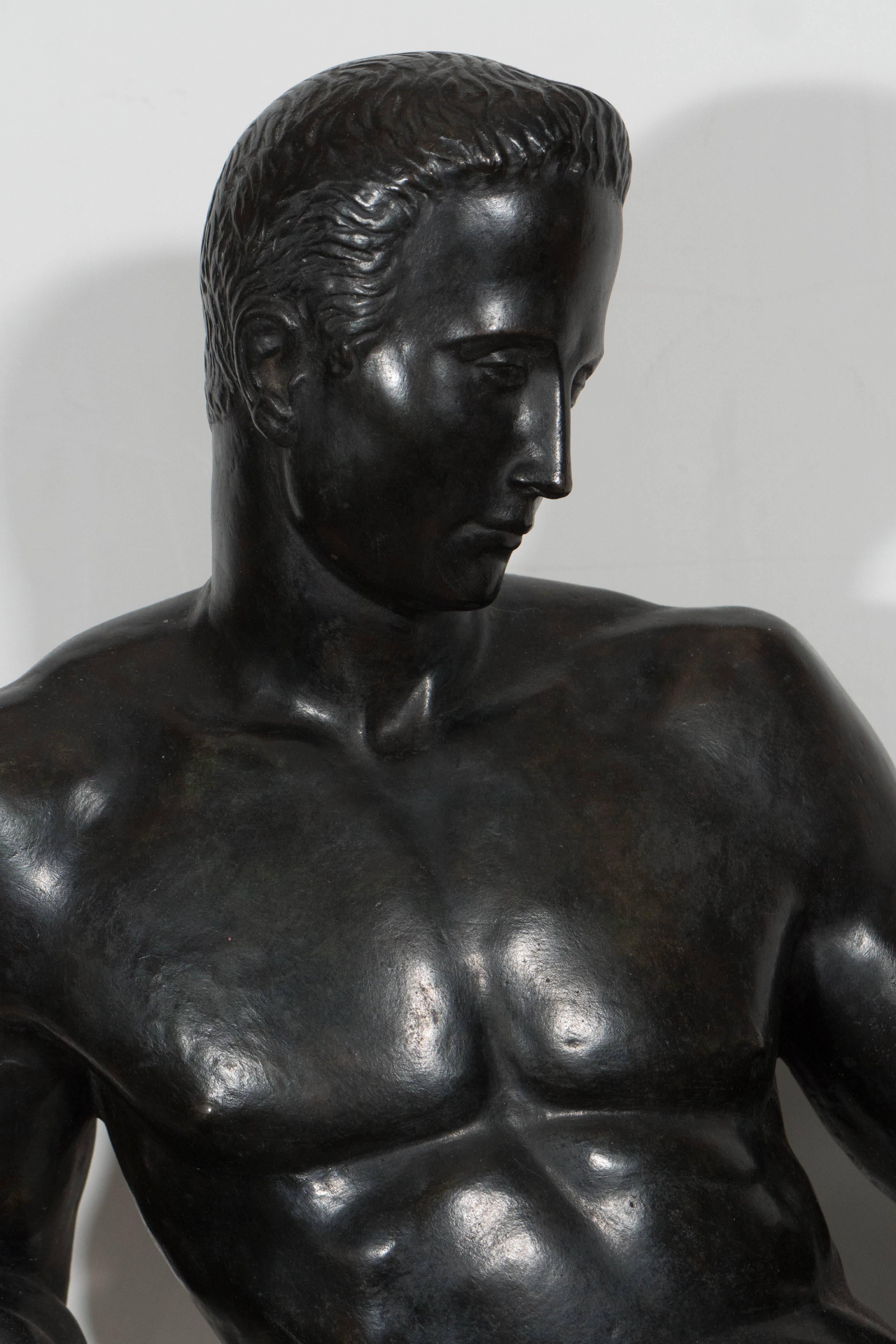 This sculpture of an academic male nude, a beautiful display of neoclassical form and grace, created in Italy circa 1930s by an unknown artist, comes in patinated bronze, reclining against a stepped marble base. The sculpture remains in very good