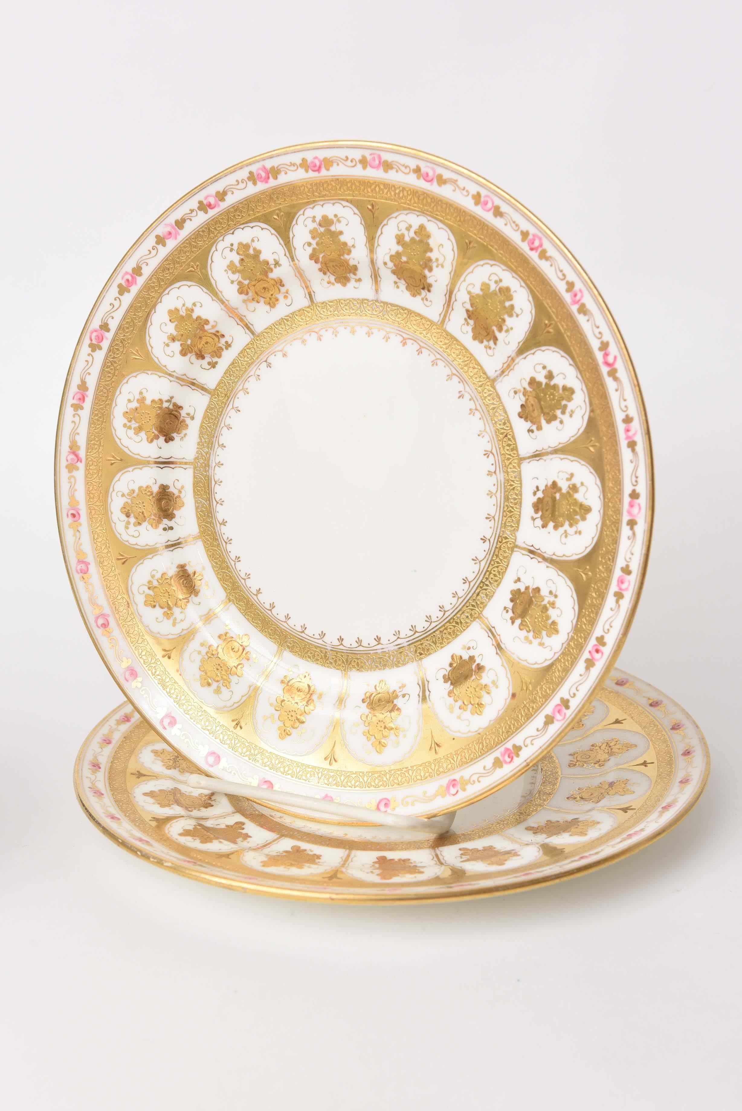 What nice details this set of 12 plates have. Great raised gilt encrusted borders in an interesting design along with sweet hand-painted floral on the edge. A great size for everything: first course, salads or desserts. They are in very nice antique