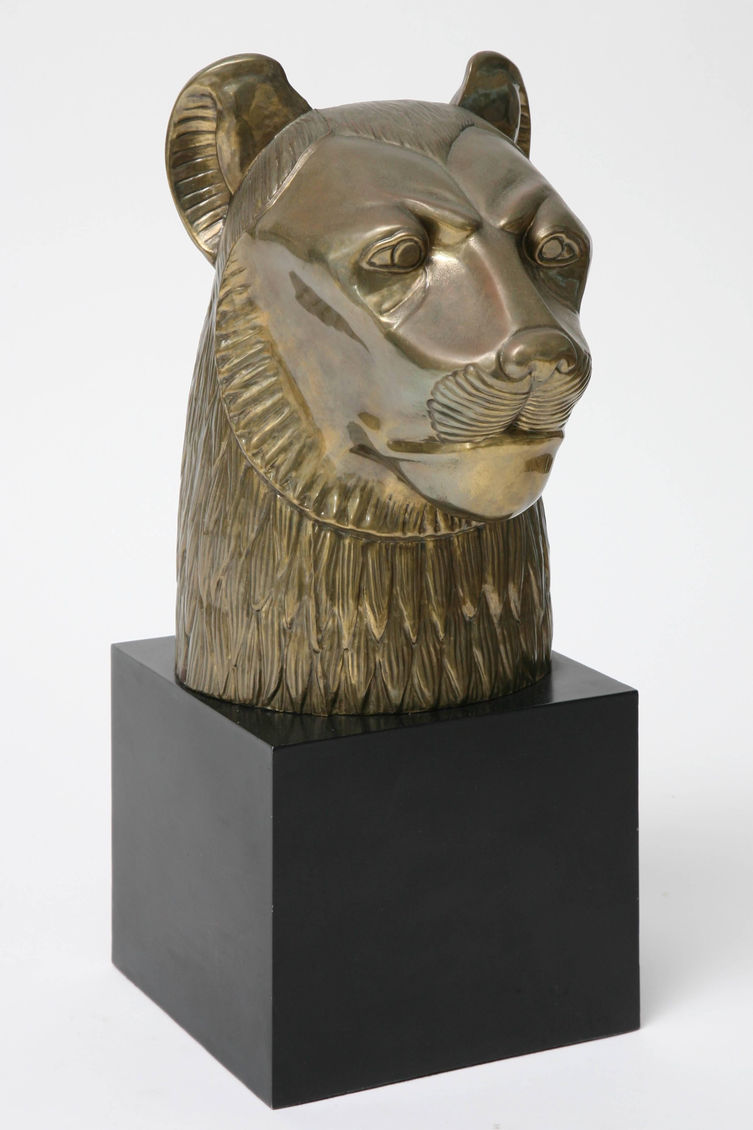 This handsome antique brass finished metal sculpture of the Egyptian goddess Sekhmet was produced by the Chapman Manufacturing Company to coincide with The Treasures of Tutankhamun tour, which ran from 1972 to 1981 in the United States.

Note: The