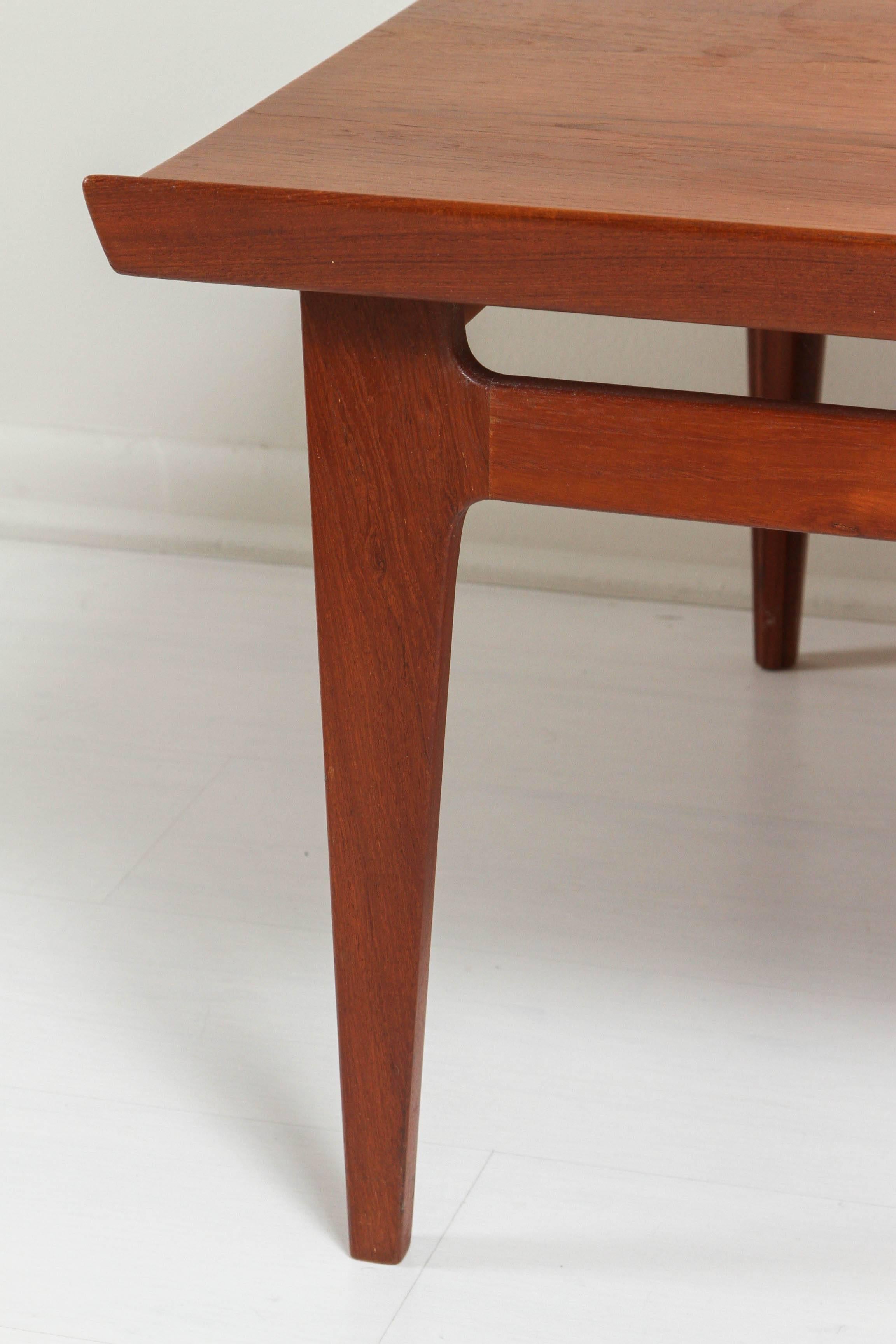 Vintage danish teakwood mid-sized table by Finn Juhl for France & Son.