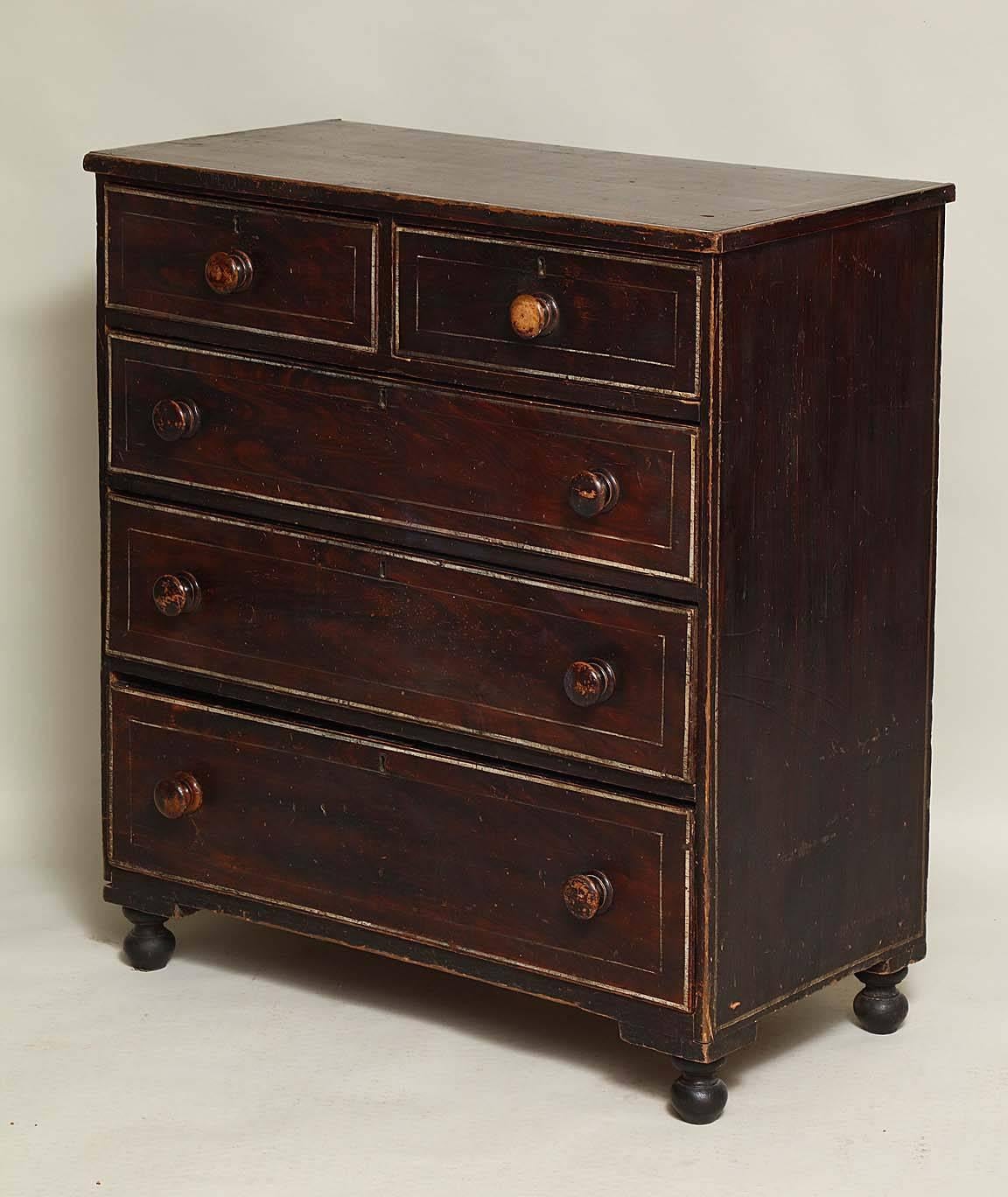 Good English country faux rosewood grained chest of two over three drawers, the top, sides and fronts with simulated rosewood and string inlay, with original turned wooden knobs and feet, the whole with pleasing worn and patinated painted surface.