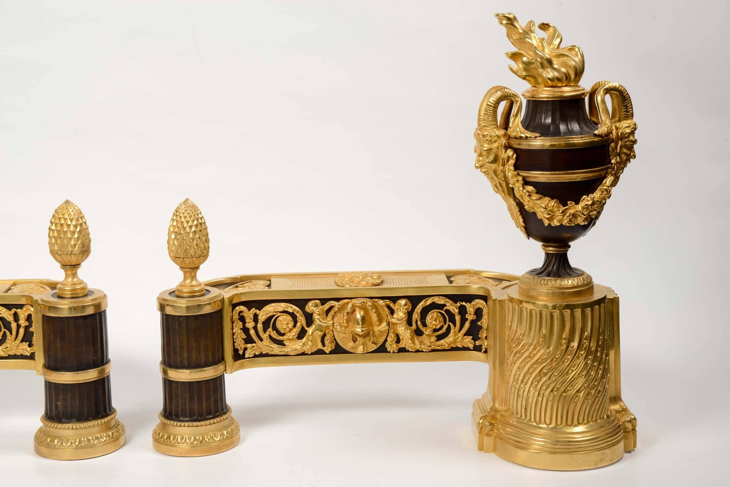 Pair of French chenets signed Bouhon (late 19th century) in the Louis XVI style.
 