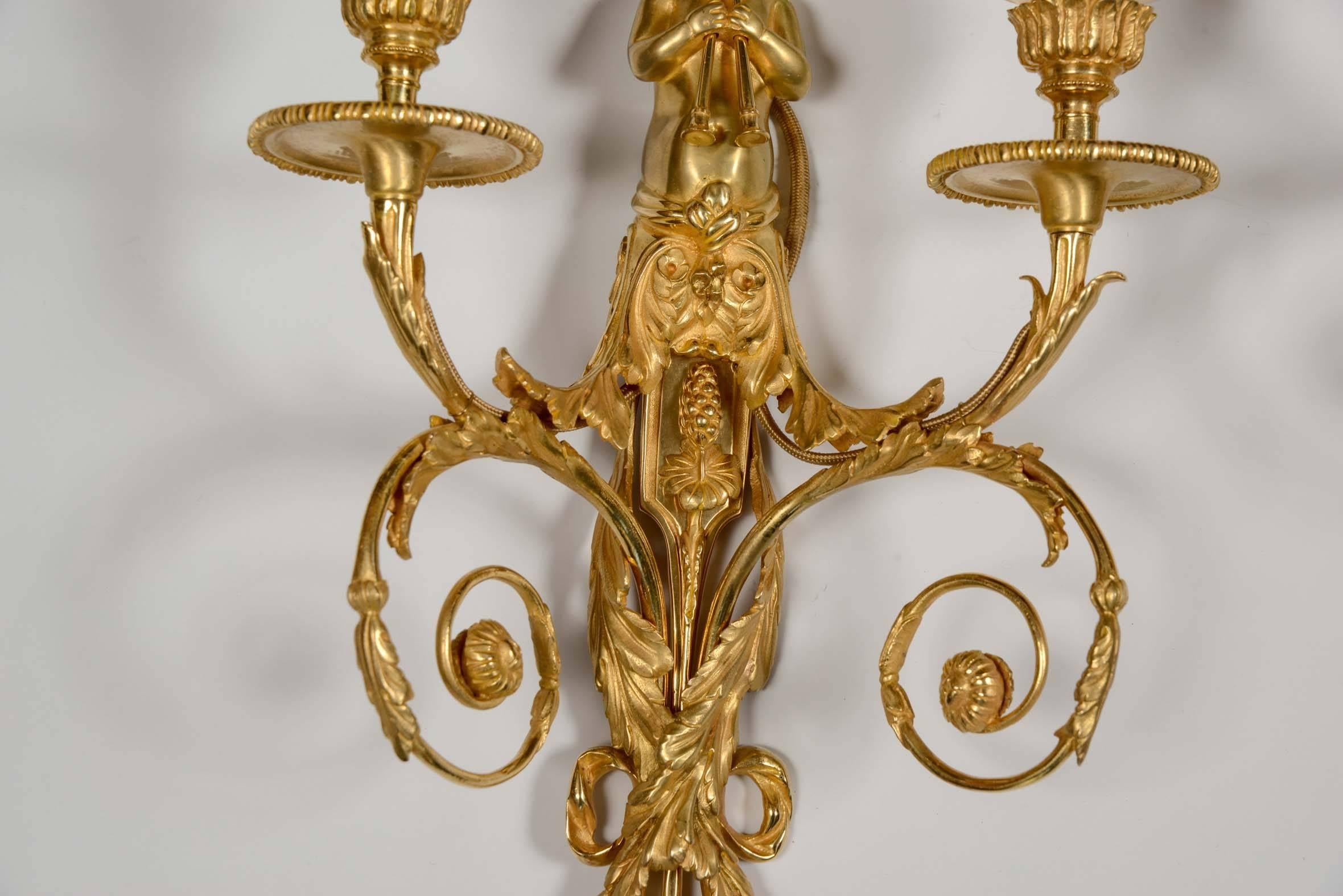 Gilt Pair of Wall Sconces in the Louis XVI Style For Sale