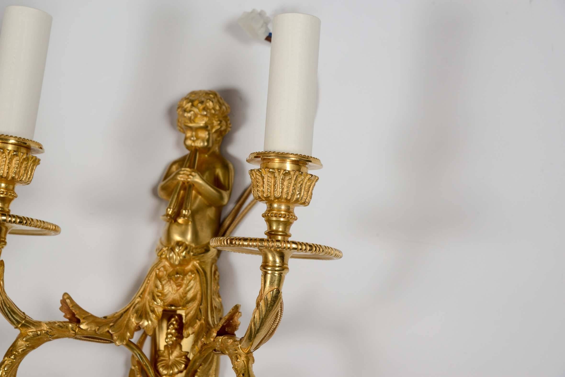 Gilt Pair of Wall Sconces For Sale