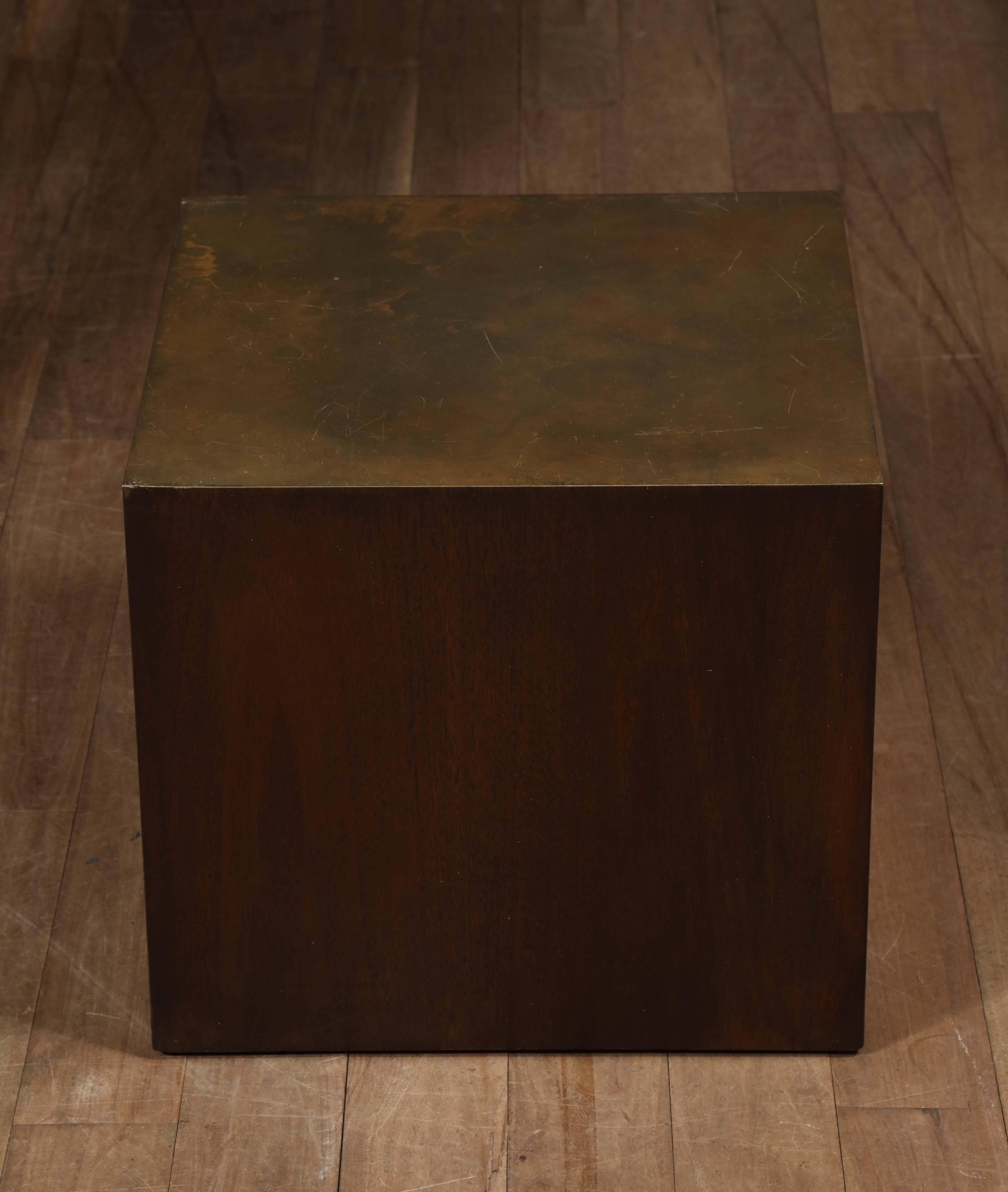 Modernist cube side table refinished in a dark walnut finish, brass plate top with patina.