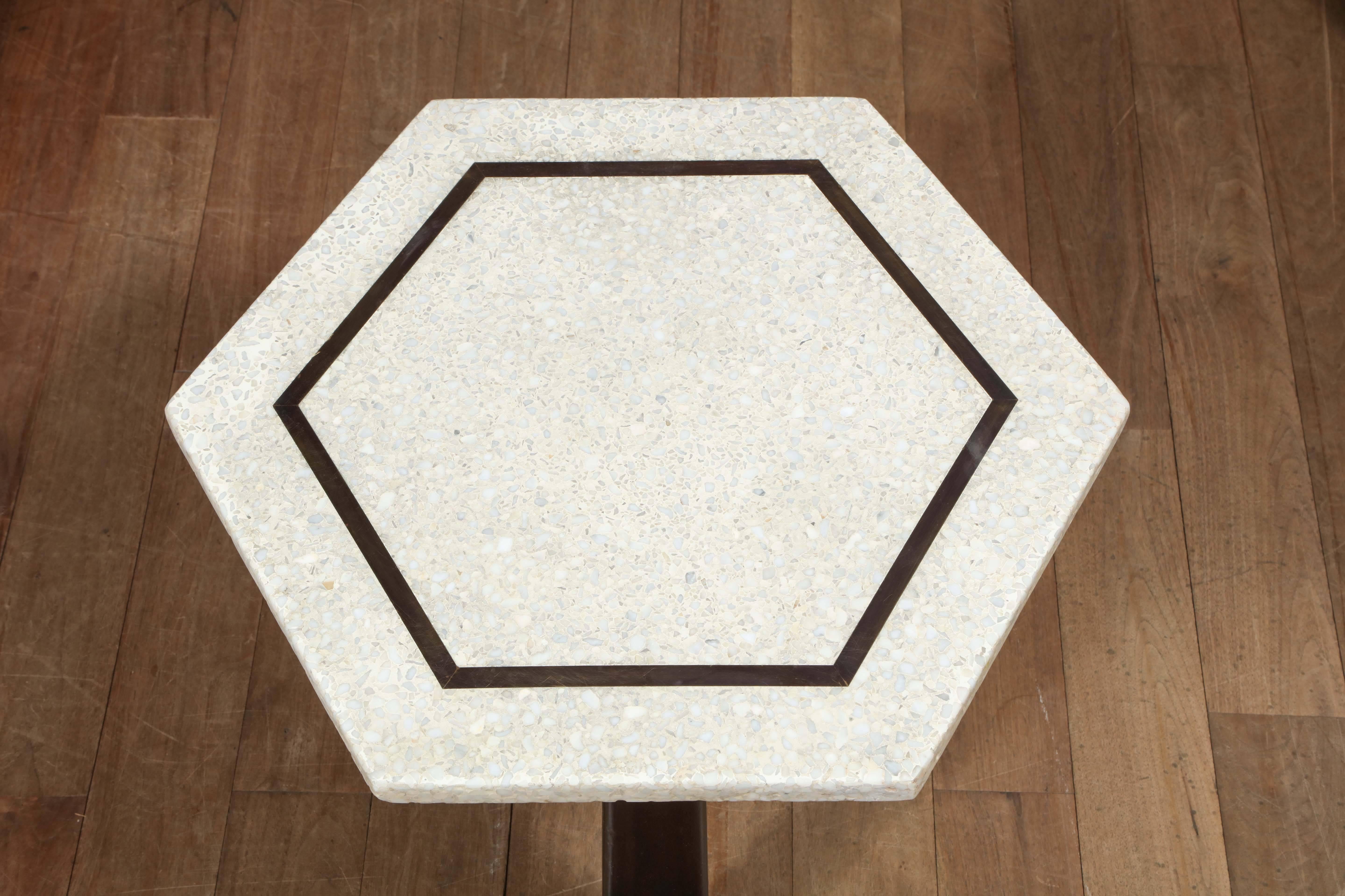 Harvey Probber hexagonal side table with travertine top with patinated brass inlay, circa 1950.